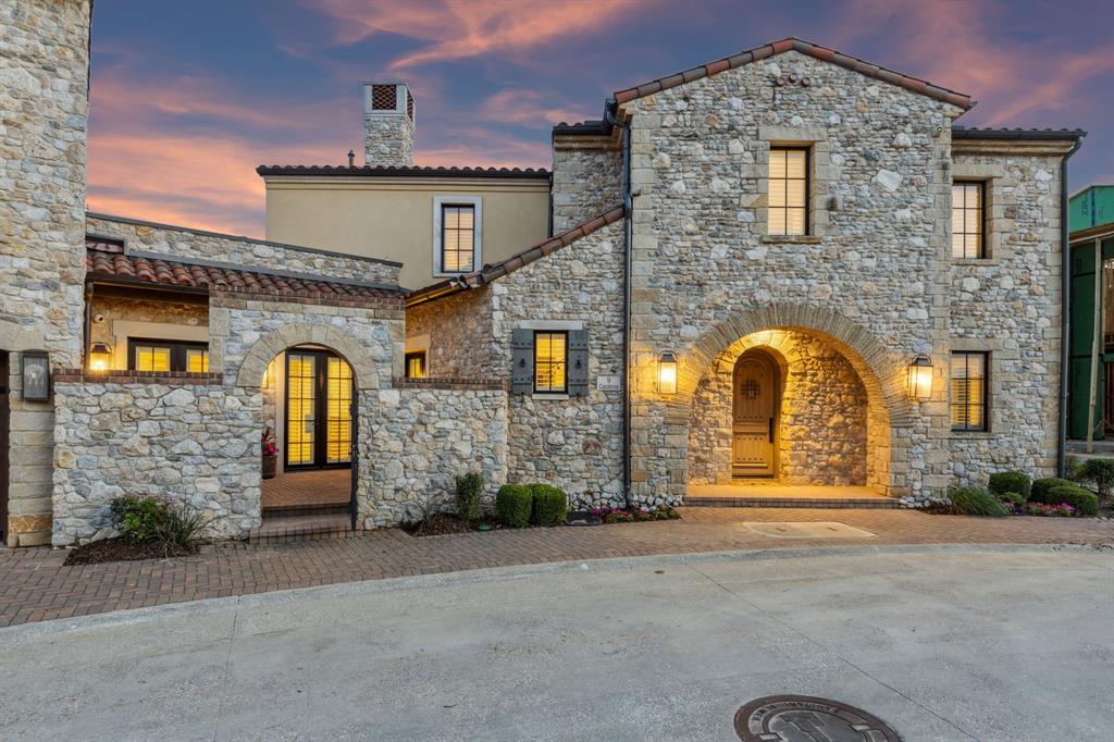 Discover this exquisite Calais Custom Home, artfully positioned on a premier corner lot in Westlake Entrada—a European-inspired village reflecting the timeless charm of Catalonia, Spain. Built by one of DFW’s premier luxury builders, this lock & leave masterpiece combines Old World elegance with modern convenience in one of Westlake’s most exclusive communities. Step inside to hand-scraped white oak floors, soaring 10’ ceilings, designer lighting, and impeccable craftsmanship throughout. The chef’s kitchen is a statement of refined taste, featuring marble countertops, Sub-Zero & Wolf appliances, and seamless flow into the open-concept living and dining areas. French doors open to a private stone courtyard with built-in grill—ideal for alfresco dining and effortless entertaining. The main level includes a serene primary suite with a spa-like bath and boutique-style walk-in closet, along with an executive study for work or retreat. Upstairs offers a spacious living area, a private balcony, an en-suite guest bedroom, and a third bedroom with full bath. Additional highlights include custom wood shutters, energy-efficient foam encapsulation, security system with cameras, fire suppression system, a dedicated home automation closet, and an epoxy-finished 2-car garage. Located just minutes from DFW Airport, Southlake Town Square, Westlake Lifetime Fitness, and leading corporate campuses including Fidelity, Charles Schwab, and Solana. Zoned to award-winning Carroll ISD and Westlake Academy (an IB World School). A rare blend of global sophistication, luxurious finishes, and unmatched accessibility.