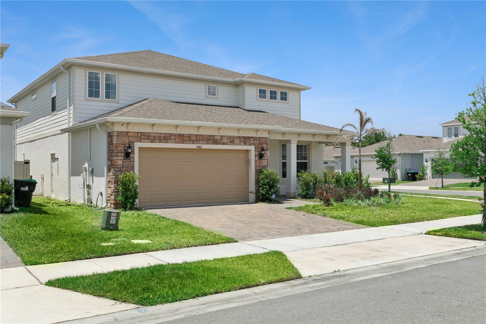 Grand Palm Drive is a beautifully upgraded 5-bedroom, 5-bath home perfectly positioned on a premium corner lot in one of Orlando's most desirable communities. Only three years old and meticulously maintained, this move-in-ready home shows like a model and offers over $50,000 in builder upgrades and custom enhancements. The open-concept design creates seamless flow between the kitchen, dining, and living areas, making it ideal for everyday living and entertaining. Step outside to enjoy your private outdoor retreat complete with a fully equipped summer kitchen, perfect for BBQs, gatherings, and relaxing Florida evenings. Conveniently located near top-rated schools, shopping, dining, and major highways, including easy access to Highway 408, this home is ideal for growing families and medical professionals seeking a quick commute to Downtown Orlando and nearby hospitals. Stylish, energy-efficient, and truly turnkey, this exceptional home is ready for its next owner. Schedule your private showing today.