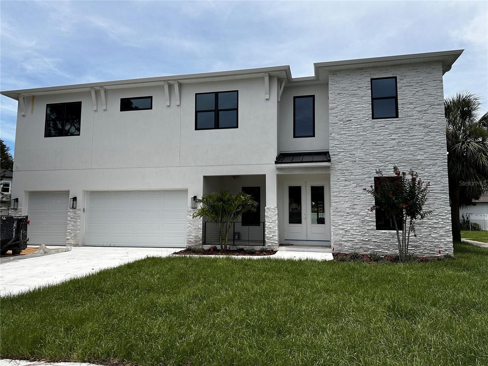 Photos and Virtual Tour are of an artistic rendering of the home for comparison purposes only and may show options/features no longer available. Nearly Complete! Completing the finishing touches now! Introducing 4009 Euclid, a breathtaking residence in the heart of South Tampa that effortlessly combines luxury, comfort, and modern style. Crafted by the esteemed Chadwell Homes, known for their exceptional quality, this nearly completed home spans an impressive 4,094 square feet. Featuring five spacious bedrooms and four full bathrooms, it’s designed with meticulous attention to detail and high-end finishes throughout.
As you step inside, you’ll be greeted by a grand foyer with high ceilings, and office, and downstairs bedroom. The gourmet kitchen is a chef’s dream, boasting top-of-the-line appliances, including a 36-inch gas cooktop, wall oven, and a custom hood. A walk-in butler’s pantry, mudroom, and laundry room enhance convenience and provide ample storage solutions.
The master suite is a private retreat, complete with a spa-like bathroom featuring custom cabinetry, dual sinks, separate shower, soaking tub, and a generously sized walk-in closet. Additional bedrooms are thoughtfully designed with walk-in closets and stylish designer touches, ensuring every family member or guest enjoys comfort and sophistication. A bonus room and study offer flexible spaces for work, relaxation, or play, while the three-car garage adds practicality.
Step outside to your spacious lanai overlooking the backyard complemented by a pool bath—perfect for enjoying Florida’s sunshine. Built with durability and sustainability in mind, this home includes hurricane strapping, impact-resistant windows, and an engineered truss system. The lush landscaping is maintained by a multi-zone irrigation system, and the exterior impresses with sand-textured stucco, a modern garage door, and double entry door.
Zoned for the highly sought-after Plant, Coleman, and Mabry school district.
Located in the desirable Bel-Mar neighborhood, this home offers convenient access to Downtown Tampa, Hyde Park, Tampa International Airport, International Plaza, and more. Don’t miss the opportunity to own this extraordinary home. Contact us today for a private showing!