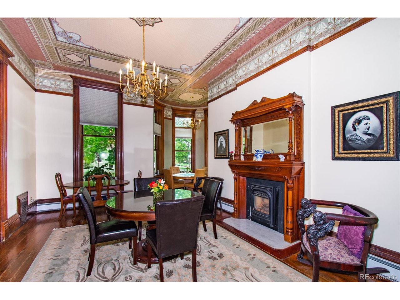 Discover the remarkable Lumber Baron Inn, an iconic 1890 Victorian mansion situated on a 14,000 sq. ft. corner lot in Denver's historic Potter Highlands neighborhood. Rich in architectural character and restored to reflect its original design, this 9,700 sq. ft. property features five en-suite bedrooms, multiple formal living and dining spaces, and a commercial-grade kitchen, offering extraordinary versatility for residential, hospitality, or mixed-use living.The home includes a spacious third-floor ballroom with private restrooms-perfect for events, retreats, studio uses, or creative redevelopment. The garden-level offers a fully functional owner's apartment, ideal for live-work, on-site management, or private guest accommodations. Outdoors, the property provides mature landscaping, serene gardens, and expansive hardscaped areas suitable for gatherings or everyday enjoyment.Zoned PUD, the property allows lodging, social activities, and private functions for a fee, but can also be reimagined as a single-family residence, boutique inn, corporate retreat, creative residential compound, or other custom lifestyle concept. Located within the historic Potter Highlands district, the home sits among tree-lined streets, landmark properties, and walkable neighborhood amenities, yet remains just minutes from Downtown Denver.This is a rare opportunity for a buyer who wants to operate a B&B/event venue, create a signature live-work estate, or reposition this architectural treasure back into a grand residential home.