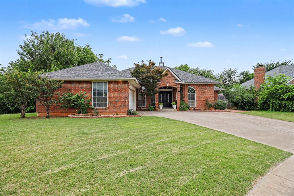 Welcome to 1700 Schooner Dr, a charming brick home tucked into a quiet cul-de-sac setting with nature, privacy, and neighborhood amenities just outside your door. This home backs near William Morgan Park, offering a scenic lake, walking/running trails, a floating boardwalk over the marsh, picnic areas, a half-court basketball court, and a recently upgraded boulder-themed playground with synthetic turf and shade structures. Enjoy the peaceful surroundings, wildlife, wild birds, fish, turtles, herons, and the rare benefit of a small neighborhood with no through traffic and only one neighbor to the north.Inside, the home offers a spacious and inviting layout with warm wood-look flooring, tall ceilings, crown molding, arched windows, and great natural light throughout. The living room features a fireplace and plenty of space to relax or gather. The formal dining area adds character with oversized arched windows. The kitchen provides abundant cabinet storage, generous counter space, a center island, built-in appliances, gas cooktop, and a bright breakfast area overlooking the backyard.The primary suite is spacious and filled with natural light, offering a large bathroom with dual-sink vanity, walk-in shower, separate tub, and great storage. Additional bedrooms provide flexibility for guests, hobbies, or a home office, including a room with built-in desk and shelving. The utility room includes extra storage, while the oversized driveway and two-car garage add everyday convenience. With a beautiful park-like setting, mature trees, nearby trails, pond views, and a peaceful location, this home offers comfort, character, and a setting that is hard to find. Schedule your private showing today.