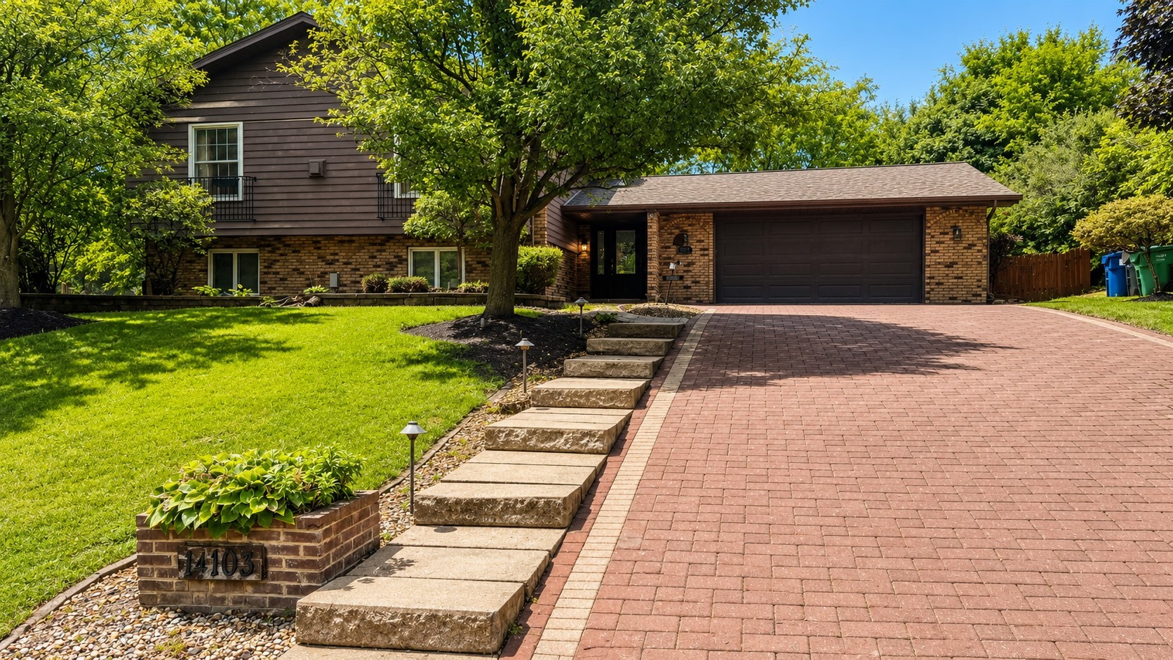 Welcome to this beautifully updated 4-bedroom, 3-bath ranch tucked away on a quiet, tree-lined street in Homer Glen. Step inside to a bright, open layout filled with natural light, stylish finishes and inviting spaces designed for comfortable everyday living and effortless entertaining.    The heart of the home is the impressive kitchen, featuring an oversized quartz island with seating, white shaker cabinetry, stainless-steel appliances, a gas cooktop with statement range hood, pantry storage and convenient access to the outdoor deck. The kitchen flows seamlessly into the spacious living and dining areas, where warm flooring and a striking stone fireplace create a welcoming atmosphere.    The fully finished basement offers even more space to enjoy, including a generous recreation area, wet bar, second fireplace, built-in shelving, a fourth bedroom, an updated full bathroom with double vanity and tiled shower, and abundant storage. This versatile level is ideal for movie nights, entertaining, overnight guests, a home office or a private retreat.    Additional highlights include updated bathrooms, recessed lighting, ceiling fans, professional landscaping, a brick-paver driveway, Hardie Board siding, a roof installed in 2020, and a sump pump with battery backup. Conveniently located near schools, shopping, dining and major roadways, this move-in-ready home offers the space, comfort and modern style.