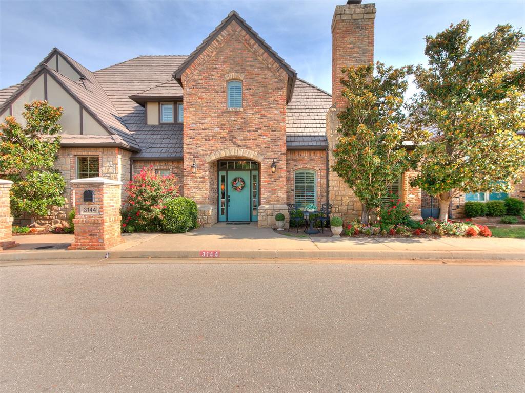 Move-in ready luxury townhome in the highly sought-after Brookhaven Square, offering flexible living spaces and an unbeatable location. Completely remodeled in 2018, major updates include plumbing, electrical wiring, two HVAC systems, cabinetry, appliances, bathroom fixtures, flooring, and a DaVinci roof. Near shopping, restaurants, the University of Oklahoma, and I-35.This versatile floor plan features two primary suites—one on each level—both with double vanity, walk-in showers, and walk-in closets. The inviting living room features cathedral ceilings, a gas log fireplace with a shiplap accent wall, wood-look tile flooring, plantation shutters, recessed lighting, an office nook, wrought iron staircase, and a 2 car garage with ally access.The kitchen features granite countertops, abundant cabinetry, a large island with prep sink, double ovens, and a five-burner gas cooktop. Upstairs offers a spacious second living area plus a flex room behind barn doors that's perfect for a workout area, hobby room, or playroom. A walk-out attic provides additional storage.Enjoy the recently refinished covered private patio (2026), the neighborhood gazebo, and convenient guest parking just steps away. HOA-maintained common areas provide a low-maintenance lifestyle, making it easy to enjoy everything this exceptional community has to offer.