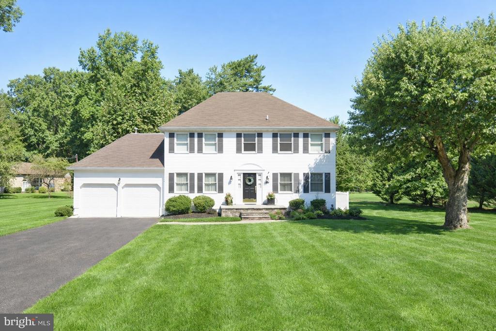 Welcome to your forever home, a beautifully maintained residence in the sought-after heart of Mount Laurel Township. A gracious entry adorned with brick pavers and manicured landscaping invites you into a home that balances elegance with everyday comfort.Situated on a large, private, fenced-in lot, this home offers exceptional outdoor space, perfect for gatherings, gardening, play, or simply enjoying quiet evenings on the deck. Inside, the presence of gorgeous hardwood floors throughout with custom decorative inlays instantly sets a tone of refined quality. Crown moldings and wainscoting add architectural interest and timeless appeal.Spacious rooms throughout offer generous space for family, friends, and those special occasions that become cherished memories. Natural light floods every corner of this home, creating an open and inviting ambiance.The updated kitchen is truly a chef’s dream:• Commercial-grade Thermador gas range with warming lights• Stainless-steel hood and a huge GE Monogram refrigerator that seamlessly matches the cabinetry• Durable granite countertops, a stylish tiled backsplash, and abundant white cabinetry• Butler’s pantry for added storage and organizational spaceThe kitchen, adjacent to the family room, features an Andersen sliding door overlooking the deck and fenced backyard, making indoor-outdoor living effortless.Retreat to the large primary bedroom suite, complete with a sitting room/dressing area, an oversized walk-in closet with additional storage, and easy access to attic space for seasonal storage. The primary bath is a true sanctuary with a large jacuzzi tub and oversized walk-in shower, the perfect place to relax after a long day.Three additional bedrooms feature rich hardwood floors, crown molding, and recessed lighting. The oversized garage, equipped with rubber tile flooring,  includes a convenient backyard exit and a washer and dryer, new tankless water heater (2026).This home offers wonderful functional upgrades, elegant finishes, and space for everyone in the family.Mount Laurel blends suburban comfort with convenience and amenities for all ages. Enjoy a variety of local attractions, shopping, recreation, and easy access to major routes like 295, NJ Turnpike, Route 73, Route 70, and Route 38. 1-hour from the Jersey shore and less than 30 minutes from Center City Philadelphia.Local attractions to the area include Laurel Acres Park, one of the area’s largest parks, offering seasonal events, walking trails, athletic fields, playgrounds, sledding hills, fishing ponds, and community gatherings. The Funplex, a family-friendly amusement and entertainment center with water slides, go-karts, bowling, and more near Route 38. XL Sports World and Igloo Ice Rink are popular for year-round sports and activities. Nearby public gardens, community events, and outdoor options provide plenty of opportunities to enjoy nature and active living. East Gate Square Shopping Center is a major retail hub on the Mount Laurel/Moorestown border with shops, services, and dining. Centerton Square and Route 38 offer a variety of restaurants (including local favorites) and major retailers like Wegmans, Target, and Costco.Top local schools include Parkway Elementary, Springville Elementary, and Countryside Elementary, each with strong academic performance indicators. Lenape High School is part of the Lenape Regional High School District and is known for its broad curriculum options and strong community reputation.Make time to see this one!