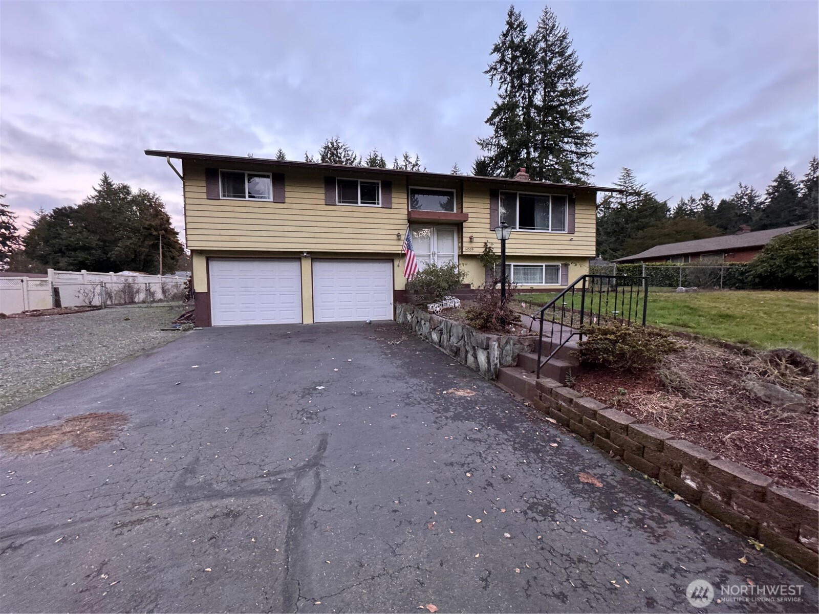1/4 acre lot, and 1800+ sq. ft. home with no HOA. Conveniently located close to JBLM, schools, shopping and more! Split level 3 bedroom, 2 baths.  All bedrooms are located on the upper level and have french doors on the closets. Air conditioner. RV Parking in addition to the large 2 car garage with storage and workbench. Large deck off the kitchen and dining