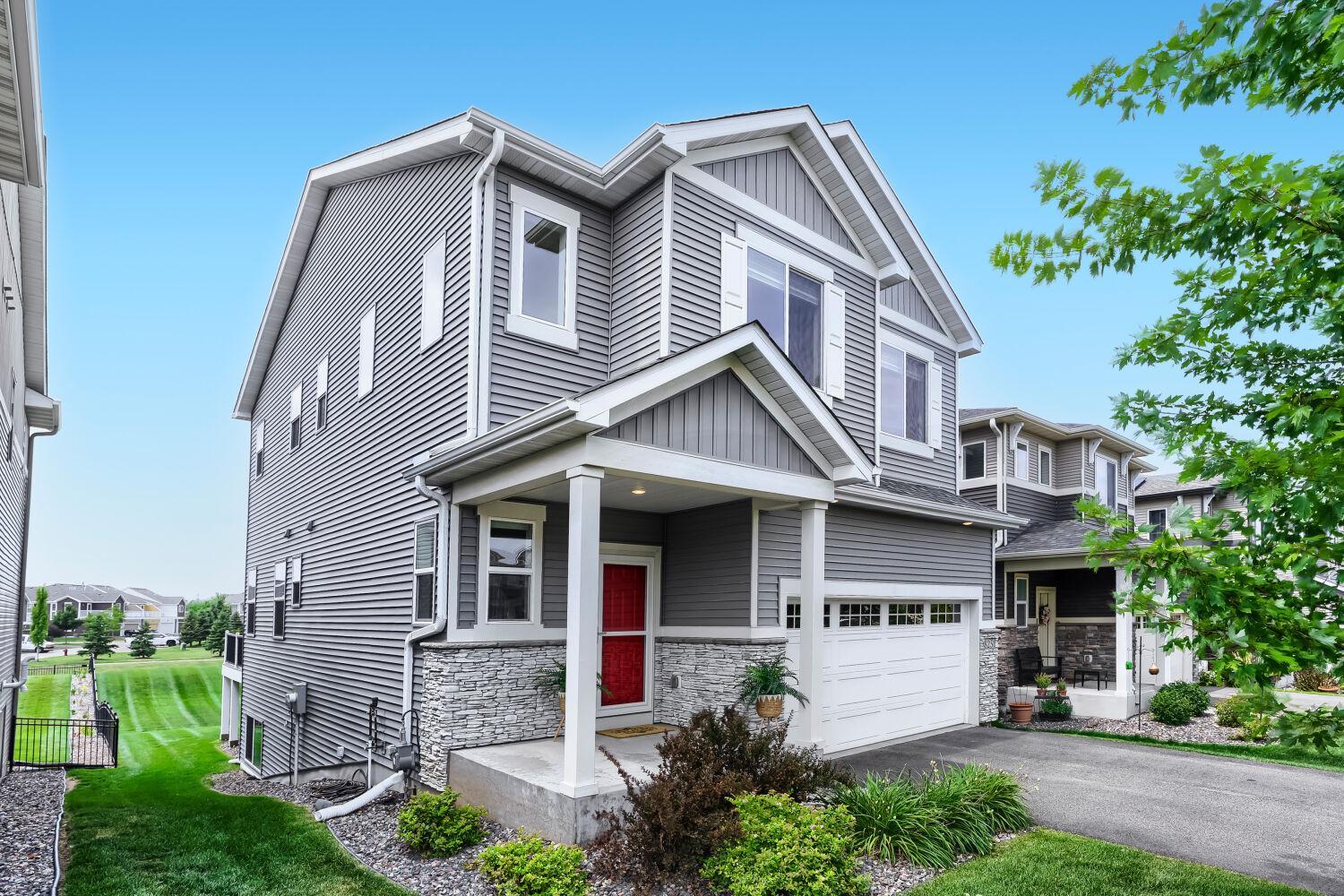Beautifully maintained newer construction in the highly desirable Lakeview at Central Park neighborhood of Maple Grove (No HOA)! This light-filled two-story home features an open floor plan designed for today's lifestyle. The spacious kitchen features quality cabinetry, abundant workspace, and flows seamlessly into the dining area and and living room with a cozy gas fireplace—ideal for everyday living and entertaining. Upstairs, you'll find four bedrooms on one level, including a spacious owner's suite with a private bath and walk-in closet. A large upper-level laundry room adds everyday convenience exactly where you need it most. The finished lower level provides exceptional additional living space with a spacious family room, recreation area, full bath, additional storage space, and large daylight windows that fill the space with natural light, making it perfect for entertaining, movie nights, hobbies, a play area, or overnight guests. One of the home's standout features is its desirable lot with no direct homes behind, offering peaceful views of the neighborhood pond and park. The home also features smart technology for added convenience, including a remote-controlled garage door, smart video doorbell, and other connected home features. A quality home water filtration system provides an added level of comfort and peace of mind. Ideally located just a short jaunt to Central Park, all the shopping, dining and activities of The Shoppes at Arbor Lakes, Elm Creek Park Reserve, miles of walking and biking trails, Weaver Lake, and more. Enjoy convenient access to I-94, Highway 610, and Highway 169, all within the highly regarded Osseo Area School District. Blending the benefits of newer construction, modern comfort, everyday convenience, and a vibrant neighborhood setting, this exceptional home is ready to welcome its next owners!