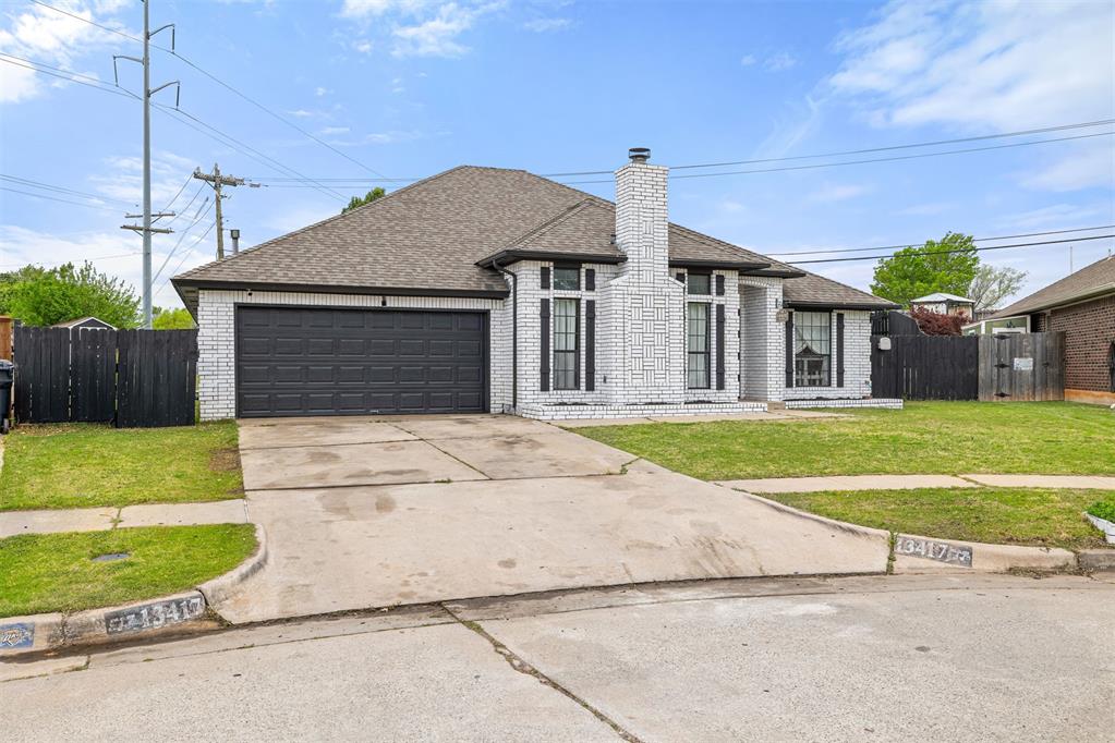 Buyer Agent Friendly! Welcome to 13417 Briar Hollow Drive in the Moore School District. This well-maintained and updated 4-bedroom home offers a split floor plan, 2 full baths, 2 dining areas, and approximately 2,181 square feet of comfortable living space. The roomy living area features engineered hardwood flooring and a fireplace, while the kitchen offers abundant storage, granite countertops, and a gas range. The oversized primary suite includes double vanities with granite countertops, double closets, and plenty of space to unwind. Two secondary bedrooms are located downstairs, and the upstairs bedroom offers flexible space for a teenager, guest room, or home office. The front living and dining areas offer lovely natural light, and there is no carpet in the home. The oversized laundry room adds extra functionality. Outside, you will enjoy a large covered patio and spacious backyard, with the property backing to Eastlake Elementary and just a short walk away. Updated farmhouse-style fixtures and ceiling fans add charm throughout. Refrigerator, microwave, Blackstone grill in the garage, and backyard patio lights all remain with the home. Average utility costs over the past 12 months were approximately $450 per month total for gas, electric, and water. Conveniently located near shopping along the I-240 corridor in Southwest Oklahoma City and the SW 19th area in Moore, with quick access to I-35, I-240, and I-44 for an easy commute across the OKC Metro. Schedule your showing today and see all this move-in-ready home has to offer.