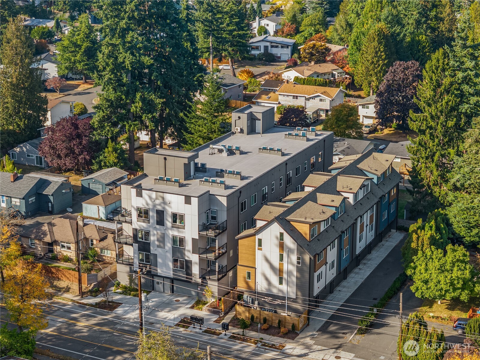 Exceptional investment opportunity! This newer 22-unit build is located in the vibrant core of Shoreline, just a short walk to the Light Rail Station. Designed w/ functionality & style in mind, the property is fully fenced & features secured parking w/ 19 stalls. Each unit offers an open floor plan w/ in-unit laundry, contemporary finishes, & modern aesthetic that tenants will love. Top-floor units boast soaring 10-ft ceilings for elevated living. Residents enjoy access to premium amenities including an elevator, bike storage, gym, community room. For peace of mind, the property is equipped w/ a live security camera feed in all accessible common areas. Turnkey, low-maintenance asset in a growing rental market w/ strong upside potential.