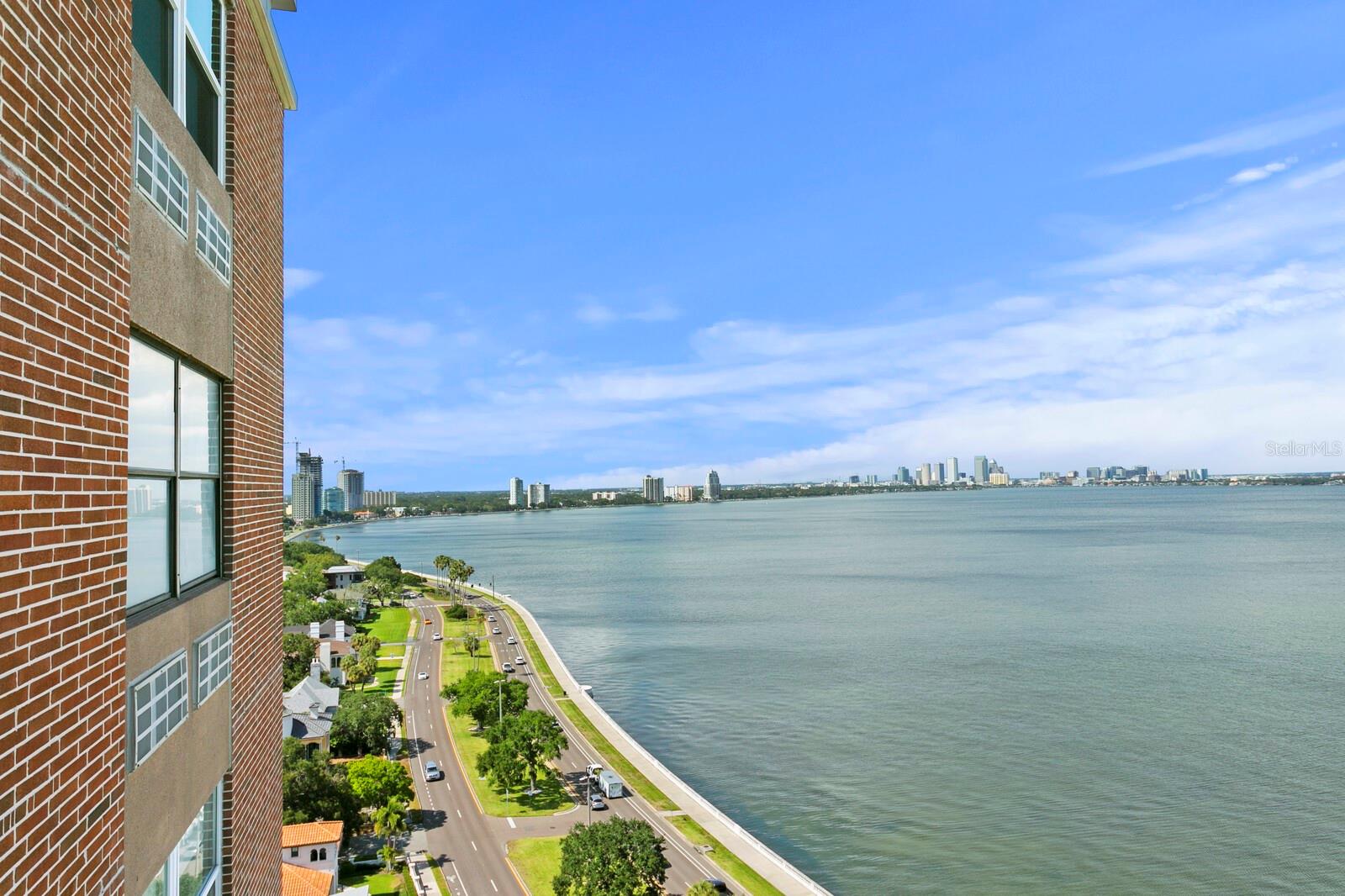 RARE 3-bedroom, 2.5-bathroom condominium gracing the renowned Bayshore Blvd in Tampa. Revel in the awe-inspiring panoramas of the bay and the city skyline from the vantage point of your private balconies. This residence has undergone a recent transformation, embracing contemporary aesthetics at every turn. Highlights include a redesigned open-concept kitchen with chic bar seating, state-of-the-art appliances, upgraded bathrooms, and the elegance of laminate wood flooring throughout. The living and dining spaces are awash in natural light, seamlessly extending to the balcony through sliding glass doors. Here, you'll find a tastefully appointed half bath featuring a shaker-style vanity. The expansive Owner Suite is a sanctuary unto itself, graced with a walk-in closet, a modern ceiling fan, and French doors that beckon you to the second balcony, where you can relish captivating bay views. The Owner Bath is a retreat of tranquility, boasting a distinctive U-shaped layout with a step-up garden tub, pristine white vanity, and an open walk-in shower. Bayshore Towers offers a wealth of amenities, including a community pool, a well-equipped fitness room, laundry facilities, bicycle storage, and assigned covered parking. Guest parking is ample, and additional storage is assigned to each unit. Two elevators ensure effortless access, while the building is fully wheelchair accessible. Security is paramount, with controlled access and a dedicated nighttime security guard on-site Beyond your doorstep, the renowned 4.5-mile Bayshore sidewalk invites leisurely strolls. Nearby, you'll discover charming ice cream parlors, exquisite dining establishments, and a vibrant shopping scene in Hyde Park. Enjoy front-row seats to the Gasparilla parade and Fourth of July fireworks. The convenience of this location extends to Hyde Park Village, the Ballast Point Pier, Amalie Arena, and MacDill Air Force Base. Seize this opportunity and make an offer today, as this fully remodeled condo on Bayshore is a testament to upscale living at its finest. Windows and sliding glass door sustained damage from Hurricane Milton.