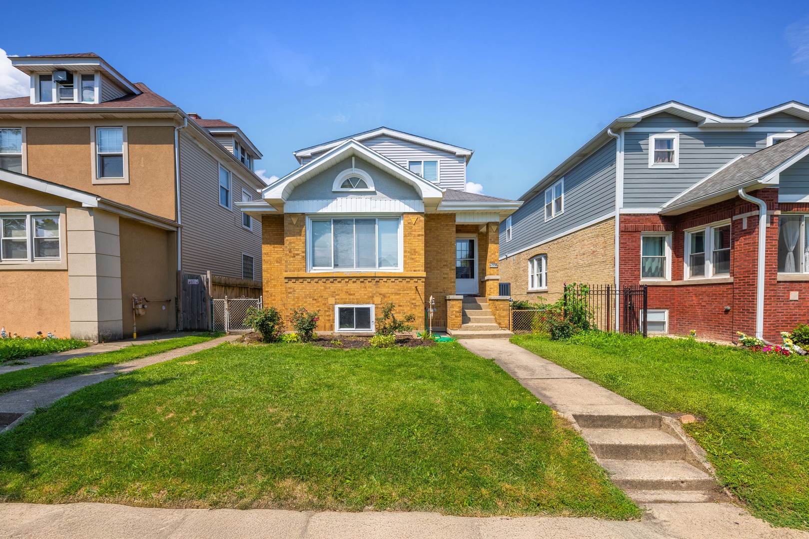 This Albany Park Gem is MASSIVE!  This updated home offers 8 total bedrooms and 3 full bathrooms, perfect for large or multi-generational families, investors, or those seeking flexible living arrangements. The main level features an open-concept kitchen and living space, 3 spacious bedrooms, a walk-in closet, full bathroom, and main-floor laundry. Hardwood floors add warmth and flow throughout. The finished basement includes 3 additional bedrooms, a full bathroom, and another laundry hookup-ideal for guests, extended family, or potential rental use.  Upstairs, the second floor functions as a private suite, complete with 2 bedrooms, a full bathroom, a living area, and access to a private deck perfect for relaxation or entertaining. Other highlights include a two-story deck, detached 2-car garage, and extra parking pad. Recent updates include new ac/ furnace & water heater. All appliances on first floor are from 2025 as well. The property is located near many restaurants and easy access to public transportation. Do not let this one slip away!