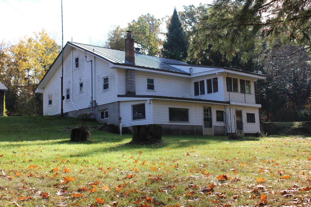 Secluded country home in Clare County set on 149.5 +/- acres! This 2 bedroom 2 1/2 bath home sits nicely back off the road among the rolling fully wooded hills and is located only a few miles from Harrison. Recent updates include flooring, kitchen and knotty pine walls in the kitchen, sunroom and master bedroom & bath. The basement features walk out access with a mudroom, half bath that does have a shower but is not hooked up and side rooms for extra storage or workshop area. An easily accessible attic is currently extra storage but could be converted into a nice bonus room. There is a detached garage for parking along with an older shop and farm barn for toy and equipment storage. The 70+/- acres of woods around the house is comprised of mature oak & maple trees along with a smaller pond and the back 80 was clear cut several years ago making way for phenomenal regrowth that provides excellent food and cover for the local wildlife. There is a trail system that provides good accessaccess to most of the property. The back 80 ac also has access from Harrison Railroad Grade. If you are interested in the home with less acreage the seller will sell the home on approximately 70 ac m/l separately.  The 80ac of vacant land to the East is also listed separately see MLS 25056264 on Harrison Railroad Grade. Whether you are searching for a permanent residence or a hunting camp with family and friends this could be it! Dial the listing agent directly for more info. The "Contact Agent" button will not take you there.
***Maps contained on our sites are there to simply depict the over all layout or shape of a given property and show what it looks like from an aerial view. These maps are neither a legally recorded map, or any type of a legal survey and should never be used as such. Also "Acreage" amounts are displayed as according to the information we have obtained through local government and are in no way guaranteed or warranted to be exact**