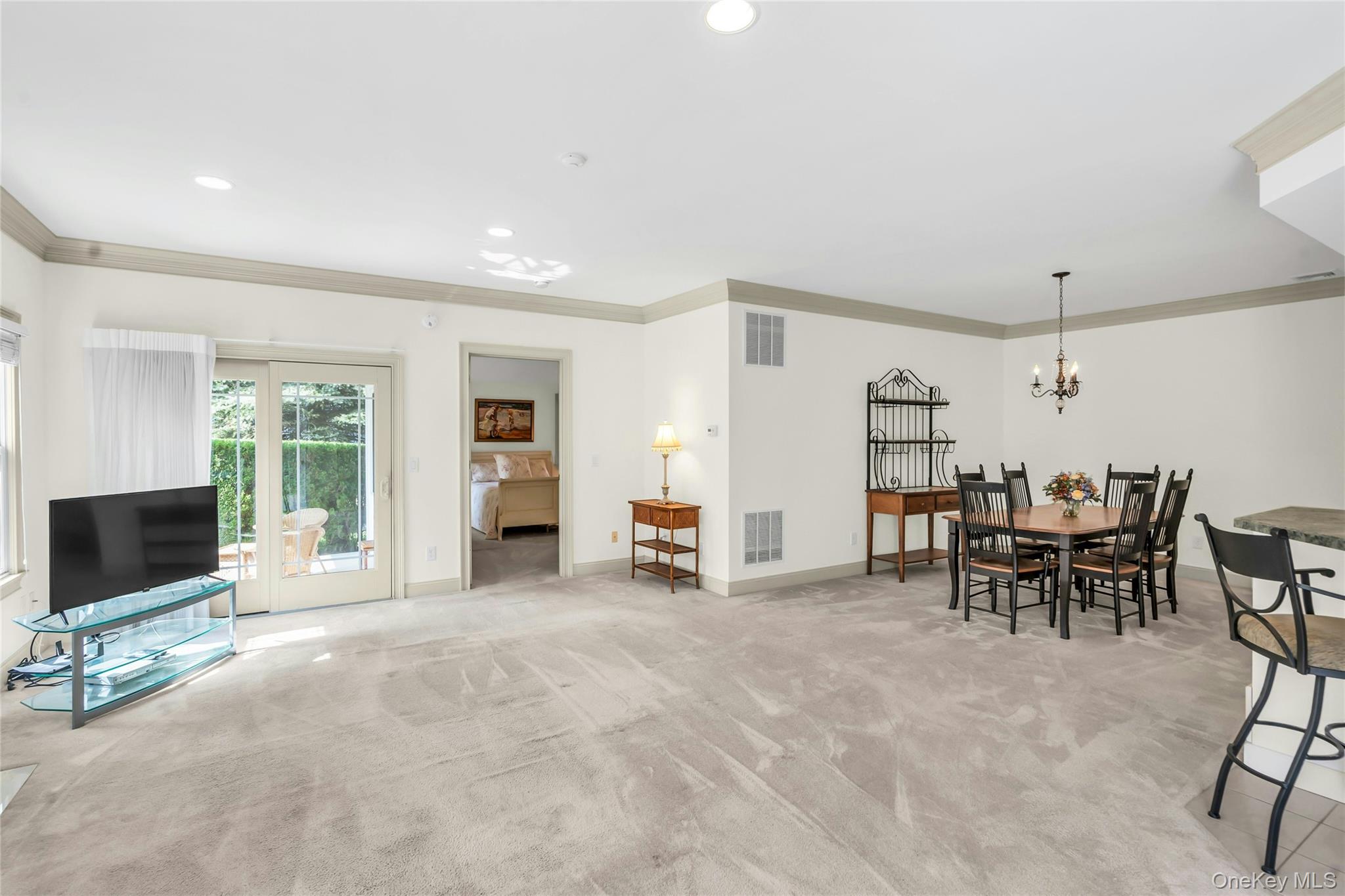 Exceptional Home Opportunity in The Oaks at Stony Brook!
Desirable and rare opportunity to experience the unique chance to own a home in The Oaks development at Stony Brook, a meticulously maintained 55-plus community with only 45 homes and low HOA's! This residence offers the convenience and comfort of one-level living, making it an ideal choice for those seeking an easy and relaxed lifestyle.
Step into a freshly painted, sun-filled home featuring soaring ceilings, exquisite crown moldings and a spacious open floor plan. The layout includes two bedrooms, with the primary suite offering an large ensuite and huge coset all thoughtfully situated on a single level for maximum accessibility. The home boasts a full, unfinished basement that can be customized to suit your needs, whether you desire additional living space or ample storage. An attached two-car garage provides added convenience and security. Built in 2005, this unit has been lovingly maintained by its original owners. Large windows allow for plenty of natural light, while a gas fireplace and recessed lighting add warmth and ambiance. Additional features include a separate laundry room and a covered private patio—perfect for enjoying your morning coffee or outdoor dining. Amenities include a saltwater pool, tennis/pickleball, putting green and club house.  Located close to shopping, dining, and Stony Brook University & Medical Center, this home offers everything needed for a fulfilling and easy lifestyle. Don't miss the rare opportunity to make 40 Oak Run your new address in The Oaks at Stony Brook!