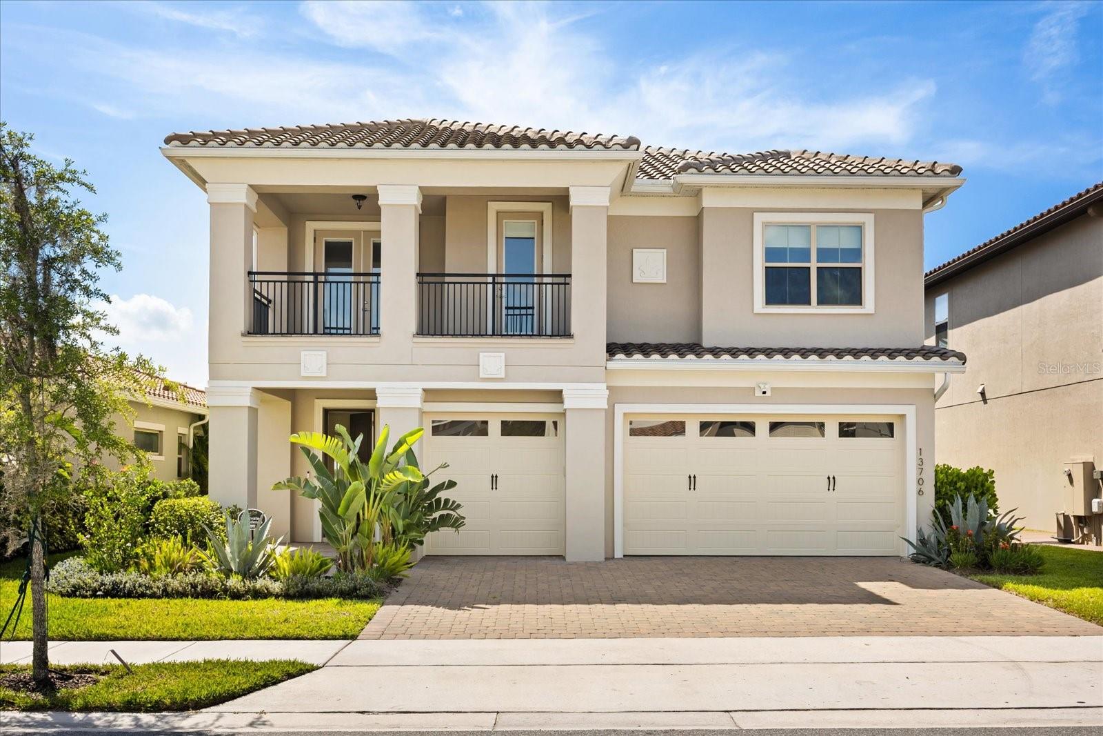 Modern Luxury Meets Resort Living in Eagle Creek Welcome to a show-stopping home in one of Orlando’s most exclusive gated communities—Eagle Creek. From the moment you step inside, you're greeted by warm wood floors, high-end finishes, and a layout designed for both luxury and comfort. The open-concept living area flows seamlessly into a sleek chef’s kitchen with Quartz waterfall counters, smart appliances, and a wine fridge—perfect for entertaining. Step outside to your private oasis: a heated saltwater pool and spa with sun shelf, travertine deck, and breathtaking water and forest views—all smart-controlled. The main-level primary suite offers peaceful privacy, motorized shades, and a spa-inspired bathroom. Upstairs, enjoy a full home theater, game loft, dry bar, and balcony views that steal the show. A second primary suite, three more bedrooms, and a second laundry room complete the space. With a 3-car garage (including an air-conditioned bay), access to world-class amenities, and a location near top Lake Nona schools, Medical City, and the Lake Nona Town Center—you're just 16 minutes from Orlando International Airport, and only 30 minutes from Walt Disney World, Universal Studios, and SeaWorld. This is more than a home—it’s a lifestyle.