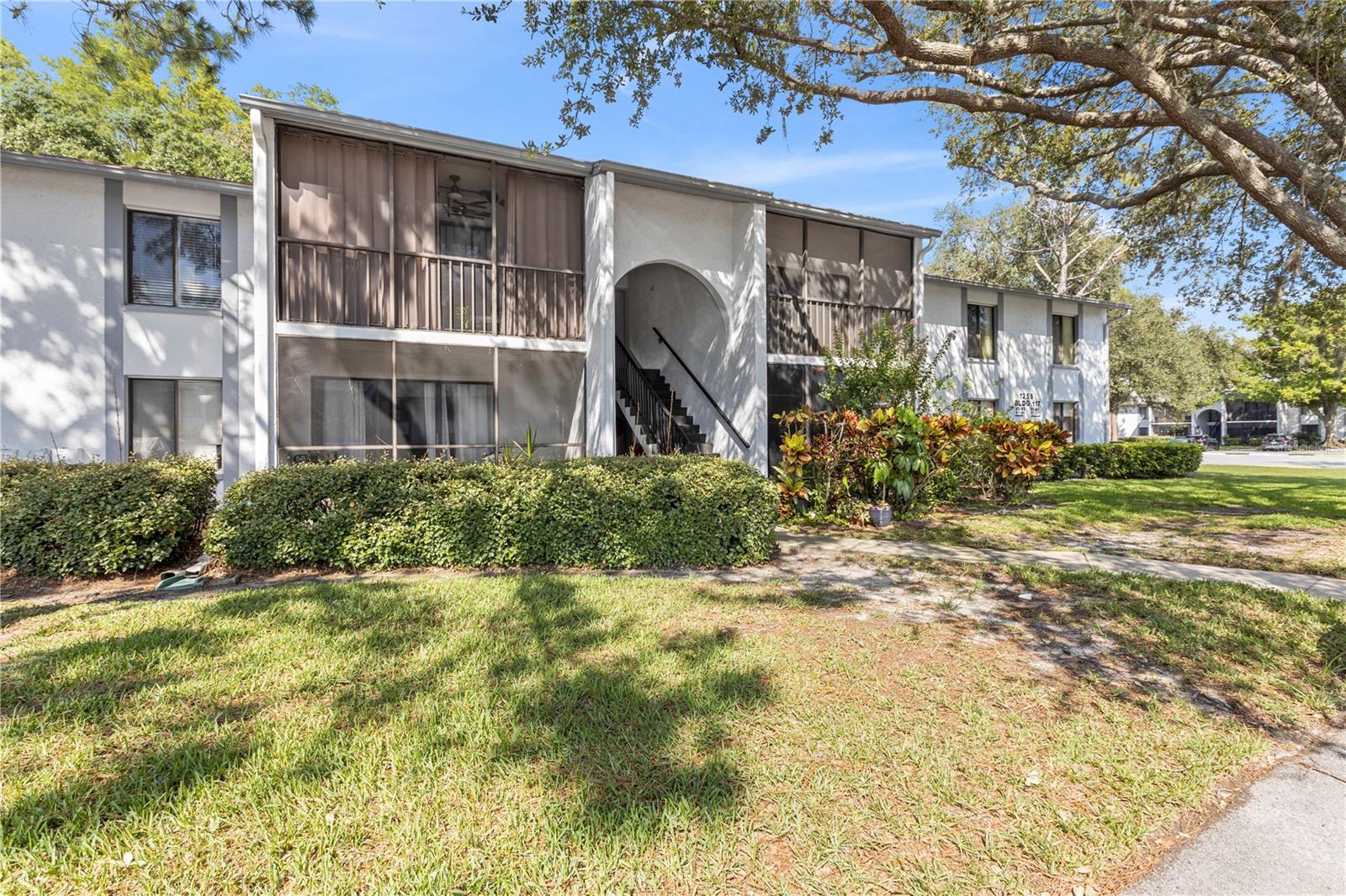 Spacious Condo with Prime Location in Pine Ridge of Tarpon Springs. 

Welcome to one of the largest floorplans in the desirable Pine Ridge community. This rare 3-bedroom, 2-bathroom unit offers both space and convenience in a serene, well-maintained setting. Freshly painted and featuring brand-new carpet throughout, this home is truly move-in ready. The kitchen is equipped with stainless steel appliances and ample cabinetry, offering a functional layout perfect for everyday living.

Located directly next to the community pool, this unit provides easy access to relaxing amenities just steps from your door. The assigned parking space is the first one by the sidewalk and is wider than any other in the complex, providing added convenience. There is also plenty of guest parking available for visitors.

The building’s roof was replaced within the last few years, giving added peace of mind. With one of the most spacious layouts in the community, this condo provides comfortable living with room to relax, work, and host guests.

Just minutes away, enjoy the charm of Tarpon Springs including the historic Sponge Docks, authentic Greek dining, Fred Howard Park, Anclote Key Preserve, and scenic trails like the Pinellas Trail. The nearby downtown area offers local boutiques, art galleries, and seasonal events, while Brooker Creek Preserve provides a nature escape for outdoor enthusiasts.

Whether you are looking for a full-time residence or a seasonal getaway, this condo offers a perfect blend of comfort, location, and low-maintenance living. Schedule your private showing today and experience all that Pine Ridge has to offer.