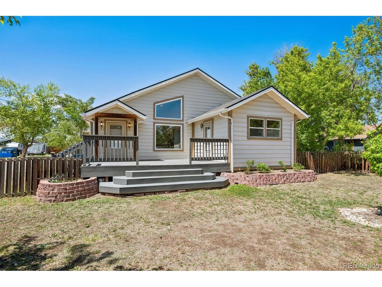 Enjoy the best of Colorado living in this beautifully maintained home offering a peaceful, country-like feel just minutes from city amenities. Located near Belmar shopping center, O'Kane Park and Washington Heights Park with quick access to downtown, the mountains, shopping, and dining, this location offers the best of both worlds.Originally established in 1931, this home offers a unique advantage-the original basement/foundation remains, while the entire above-ground structure was rebuilt in the early 2000s, providing the charm of an established neighborhood with the benefits of significantly newer construction.Inside, you'll find an open floor plan with soaring ceilings and abundant natural light. The large living room flows seamlessly into a well-appointed gourmet kitchen with a breakfast nook and a large dedicated dining room perfect for entertaining. Enjoy an expansive primary suite retreat featuring a spacious ensuite bath with a separate shower and relaxing soaking tub. A rare find in the area, this home offers an additional 3 bedrooms and 2 full bathrooms, providing added comfort and flexibility for guests, multi-generational living, or work-from-home needs. Enjoy beautifully landscaped outdoor spaces featuring a Trex front deck, newly painted back deck, mature trees, and a cozy gravel fire pit area. The oversized detached garage with workspace is perfect for hobbies, storage, or all your Colorado gear.Major upgrades include a 98% high-efficiency boiler, Mitsubishi mini-split A/C/heating system, new attic insulation, updated appliances, and numerous interior/exterior improvements. The installed solar system offers significant savings, with current electric bills averaging approximately $32/month versus an estimated $177/month without solar.No HOA, modern efficiency, and thoughtful upgrades make this home a rare find!