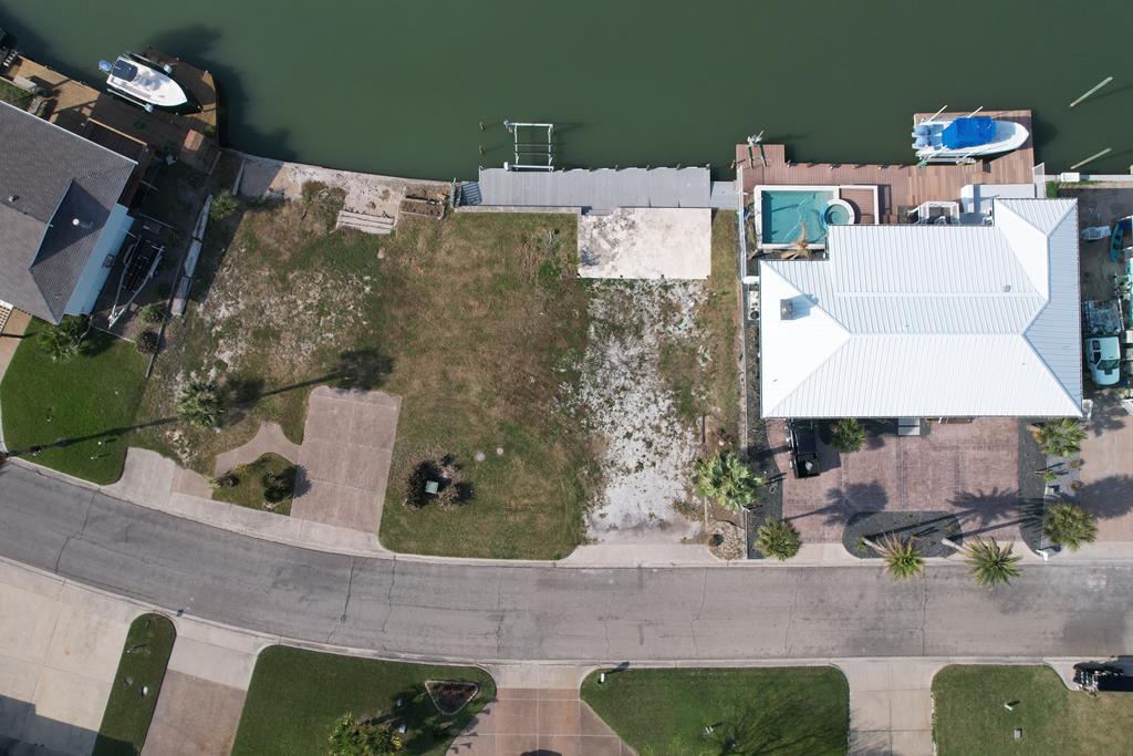 Welcome to 31 Flamingo Rd, a stunning waterfront lot located in the esteemed Key Allegro community. This prime canal front property boasts breathtaking water views and offers an exceptional location to build your dream home. With a lot size of approximately 6000 square feet and dimensions of 74X80, there's plenty of space to create a private oasis to call your own. Sellers also offering the next door lot for purchase as well. The owner has gone the extra mile to provide convenience for the new buyers by making pre-approved house plans available in a separate transaction. This ensures that the building process is smooth and efficient, giving you more time to enjoy your new home. As a part of this delightful waterfront community, you'll also have easy access to the bay, allowing for a wide range of water activities to be enjoyed. Don't let this opportunity slip away - schedule a visit today and discover the potential this piece of paradise has to offer!