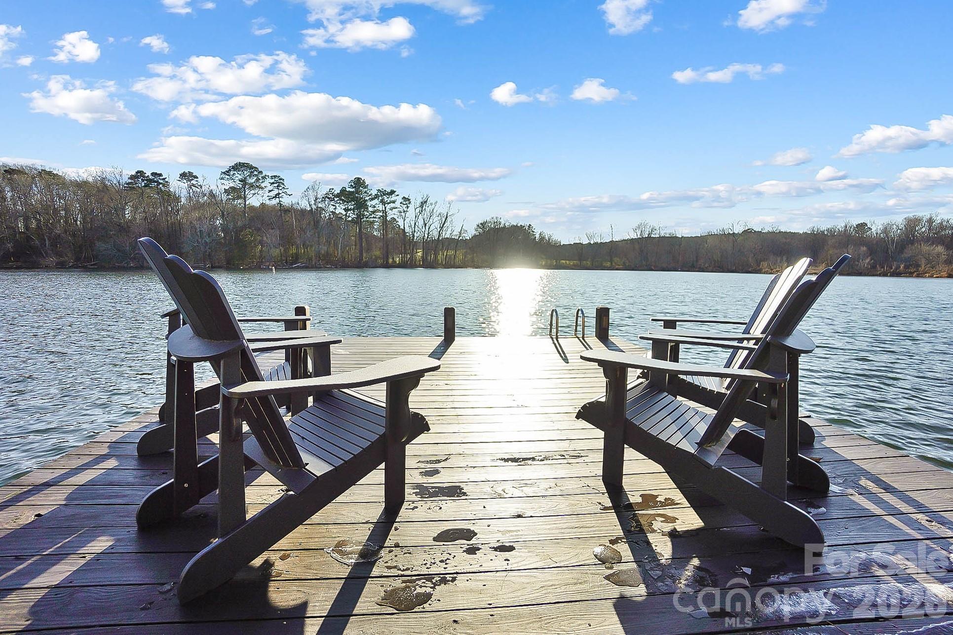 Welcome to lake life at its best on beautiful Lake Tillery! This adorable 2-bedroom, 1-bath waterfront home is the perfect blend of cozy charm and nonstop fun, with amazing lake views that truly steal the show.Step outside and enjoy an outdoor patio made for grilling and entertaining, a covered back porch, and a convenient outdoor shower-perfect after a full day on the water. The fire pit overlooking the lake is ideal for evenings with friends, and the private lakefront pier makes boating, swimming, or fishing easy and accessible.A detached 18x20 garage provides excellent storage for lake toys, golf carts, kayaks, and all your extras-something you’ll really appreciate at the lake. This property has also been a very popular short-term rental, offering strong income potential or an easy turnkey option for a personal getaway.Located in an awesome area near Norwood with local restaurants and just minutes from shopping, dining, and entertainment in Albemarle, you’ll enjoy peaceful lakefront living without sacrificing convenience.Whether you’re looking for a weekend escape, full-time lake home, or an investment property, this Lake Tillery gem checks all the boxes-and then some.