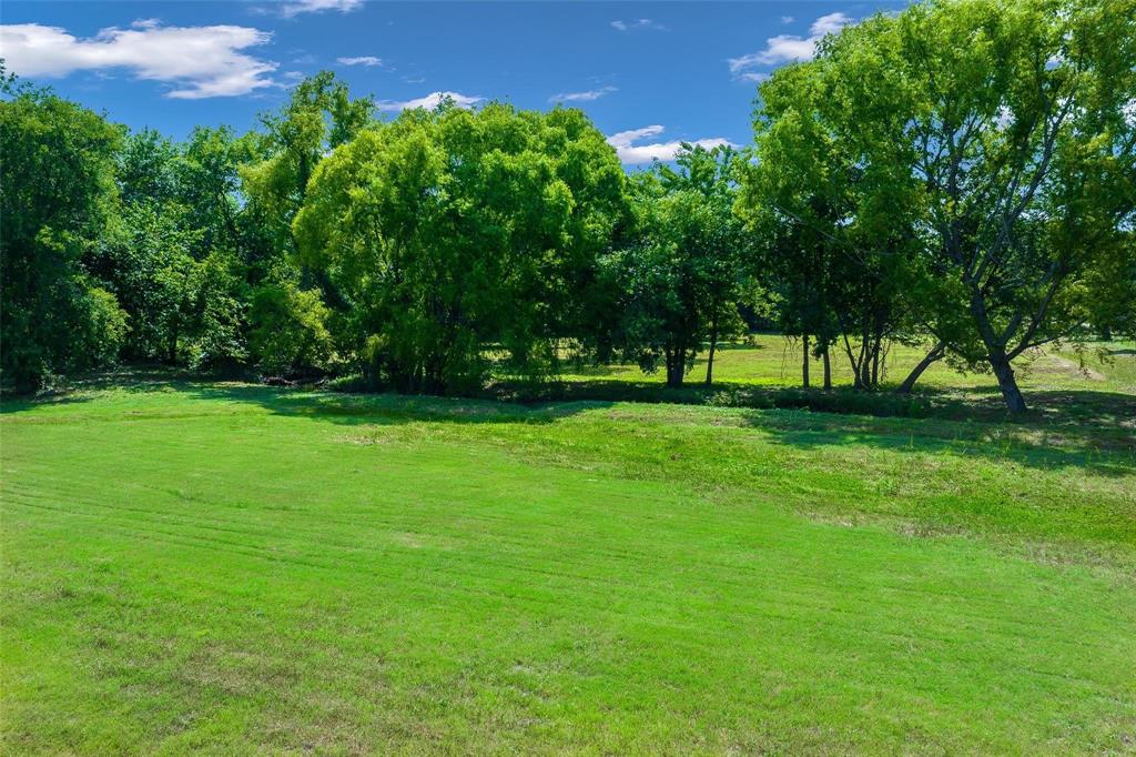 Rare Opportunity in Parker, TX – 2.26 Acres Near Southfork Ranch! Create the custom home you've always envisioned on this exceptional 2.26-acre homesite, ideally located just minutes from major highways, shopping, and dining while offering the peace and privacy of country living. This beautiful property is fully gated and fenced on three sides, with mature trees and a scenic creek that enhance its natural charm and tranquil setting. Nestled in an established area with only a few neighboring homes, you'll enjoy a rare combination of seclusion and convenience. Whether you're planning a luxury estate or a private retreat, this property provides the perfect backdrop. Don't miss this incredible opportunity near the iconic Southfork Ranch. Motivated seller—bring your best offer!  Survey is in supplements on MLS. Flood plain information can be found at fema.gov. Owner financing available Listing Agent 2 has details.