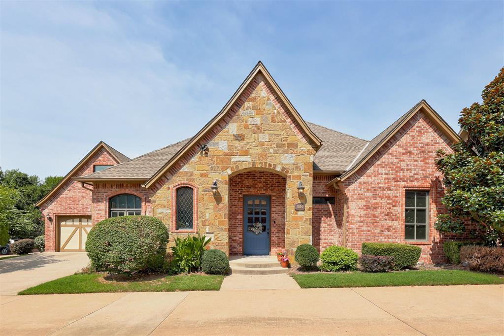 Welcome to low maintenance, luxury living at The Villas at Hunters Creek. As you walk in to this stunning home you are greeted by a fabulous open floor plan with beautiful beamed cathedral ceiling and rich wood floors. Directly to the left of the entry is a spacious study or additional living area with built-in cabinetry and privacy doors. The proximity of the main living area, kitchen and dining area creates the perfect space to gather with friends and family. The chef(s) of the home will LOVE this kitchen with its oversized island, quartz countertops, 6 burner gas cooktop, and built-in buffet/coffee bar. The primary bedroom has a lovely ensuite bathroom with double sink vanity, whirlpool tub, shower and spacious walk-in closet with built-ins. A second bedroom and full bathroom complete the downstairs. Upstairs offers an amazing space for a fun rec room OR a true 3rd bedroom with full bathroom and great closet space. The back yard has a nice private patio with fireplace to enjoy your morning coffee or an evening cocktail. This property sits on a corner lot providing a wonderful view of the neighborhood pond as well as great additional parking for guests. HOA dues provide for yard maintenance, exterior painting, gated entry, community pool/clubhouse/fitness center, common area maintenance. Owner occupied only.