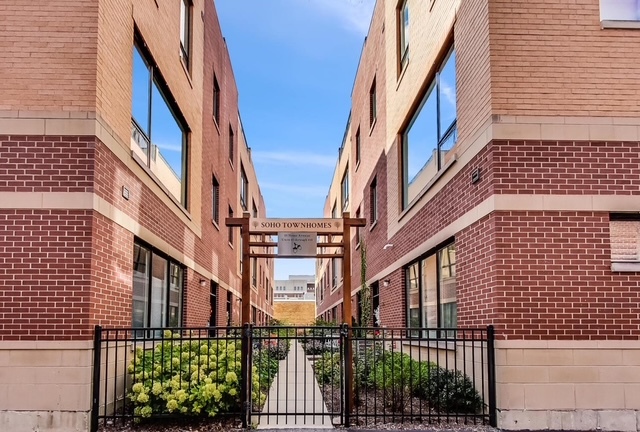 When location, space, and high-end finishes top your list, this beautifully designed open-concept corner townhome delivers it all. Featuring 3 bedrooms, 3.1 bathrooms, and outstanding upgrades throughout, it offers the perfect blend of luxury and function. The home includes a wrap-around rooftop deck with Trex flooring, custom retractable sun shade, and gorgeous sunset views. There is also a top-floor bonus room complete with built-in office space and separate heat/air. A private first-floor en-suite is ideal for guests or can flex as a home office, gym, or den. The main level boasts a bright and expansive living/dining area anchored by a gas fireplace and Chef's kitchen with sleek espresso stained cabinetry, quartz counters, Sub-Zero refrigerator, and newer stainless appliances (2023). The breakfast area accommodates a full dining table and opens to a balcony, perfect for grilling or relaxing. Upstairs, the primary suite offers a custom walk-in closet and a spa-inspired bath with double vanity, heated floors, and whirlpool tub. A sizable secondary bedroom with a large closet and a conveniently located laundry center with newer (2023) front-loading units complete this level. Additional upgrades include richly stained oak floors throughout, custom window treatments, epoxy-finished garage floor, upgraded lighting thru out, newer Furnace (2023), and more. Located in the heart of Oak Park, you'll enjoy unmatched walkability to restaurants, coffee shops, shopping, schools, Parks, the library, pool, movie theater, Metra, and Green Line stops. This is truly the best of townhome living in an unbeatable location.