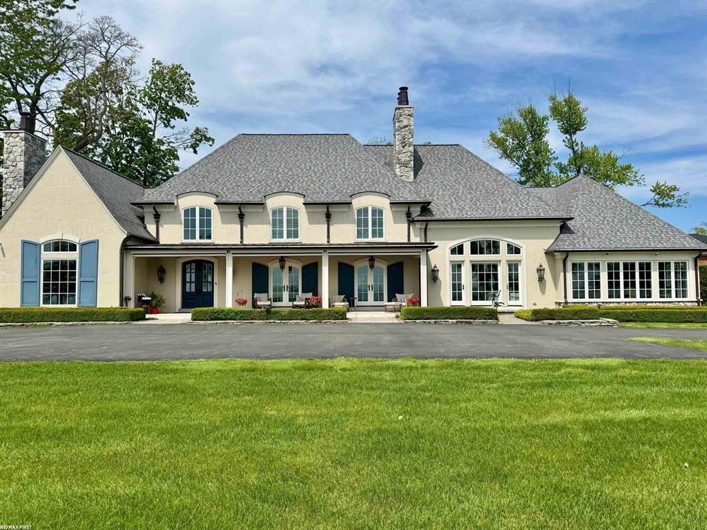 Magnificent lakefront home with panoramic lake views. Completely renovated home showcasing excellence in design, architecture and workmanship offering open layout and modern design situated on oversized 1.8 acre lot. Double door entrance leading to spacious foyer and open staircase. Elegant master suite with majestic lake views .Large gorgeous master bath with heated floors, spacious shower. Must see walk-in closet. Gourmet kitchen with an abundance of cabinets and counterspace with top of the line appliances overlooking great room with new custom fireplace. Beautiful bar/entertainment area overlooking lake. Bar with custom imported granite. High end light fixtures throughout. New custom remote blinds throughout. Remodeled laundry area. New flooring. Exquisite design and millwork throughout home. Second floor offering all large bedrooms with ensuite baths. Custom built studio apartment area with two bedrooms, bath, kitchen and living area perfect for out of town guests. Beautiful yard with inground pool and large patio area perfect for summer entertaining. Four car garage. Must see to appreciate