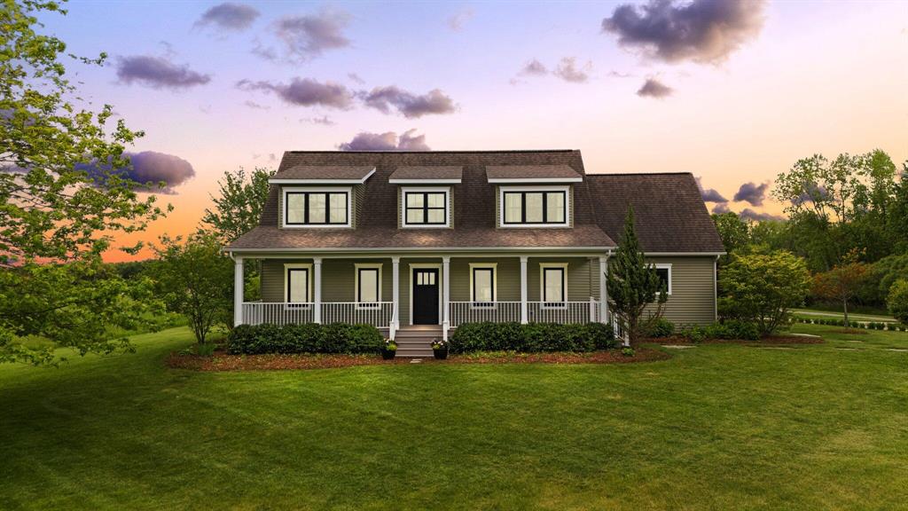 A Once in a Lifetime Property!  A masterpiece by Dangerous Architects! This true custom home should be featured on HGTV. It's a blend of modern, super energy efficient living paired with classic craftsmanship (even plaster cove moulding). This 4-5 bedroom home features a spacious primary suite on the main floor, a chef designed kitchen, big enough for big family gatherings. The living room has banks of windows viewing the arboretum. A true sanctuary! Designed with 2x6'' walls, geothermal heating, on demand water heaters and a solar array that powers the entire farm! Plus extra wide doors. There is even an elevator, for easy access to all of the floors.   The recently constructed buildings add a 60x30 workshop/ classic car barn/ hobby center with radiant heat, 16' ceilings and oversized doors (easy RV storage).  The 2nd barnis great for equipment storage with 6 bays for easy parking (100x30) and the third barn (100x120) would make a great stable and indoor riding arena with 16' ceiling height and 4 overhead doors. This property has been in hay production, so there is plenty of pasture and turnout for horses or other livestock. Woods at the back of the property add more beauty for hiking or riding trails. If all of the tillable acreage were in hay production it produces $20,700.