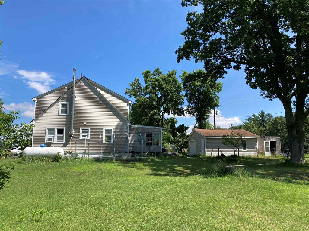 600+/- FEET ON ABBOTT LAKE and nearly instant access to trails and National Forest make this 3br, 2 bath home or recreational property the perfect place to hang your hat! Full unfinished basement, 1.5 car garage, large enclosed porch and an upstairs studio apartment with kitchen and full bath is perfect for family or company.