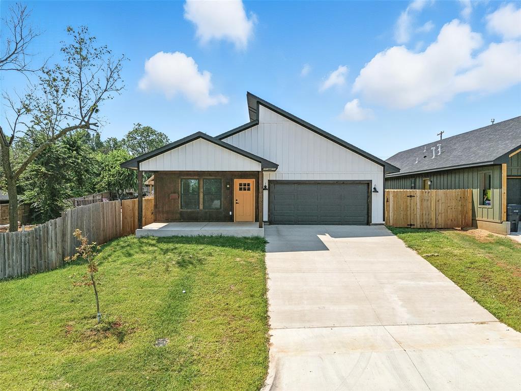 Brand-new construction only 3 minutes from Downtown OKC, less than 5 from OU Medical Center, and less than 30 minutes from Tinker AFB, Edmond and Norman, and is North-facing! This luxurious, 3-bedroom, 2-bathroom home combines modern design with high-end finishes to create a truly stunning living space. Upon entering this bright and breezy open floorplan, you are immediately greeted with a contemporary, yet cozy electric fireplace, a spacious kitchen with plenty of cabinets, stainless oven with a warmer and a "kettle faucet" to fill your pasta pot, a large farmhouse style sink and a center island with granite counter tops, along with an extra large pantry for additional storage. The primary bedroom features a gorgeous accent wall with modern sconces, a private bath with a stand-alone bathtub, double vanity, separate shower and plenty of closet space (you still have time to choose your closet hardware). Two additional bedrooms plus an extra full bathroom provide plenty of space for family and guests, along with an in-home laundry that connects to the attached two-car garage. All of this rests on a large, fully-fenced lot with a covered patio that is prime for entertaining. You can WALK to the Boathouse District in minutes from here or ride your bike to OU Med in 20! Close to tons of shopping, restaurants, and highways for easy commute, this home is as convenient as it is stylish and beautiful. PLUS, ask us about our preferred lender's programs, with up to $10,000 down payment assistance grant AND an additional $7500 lender credit!**