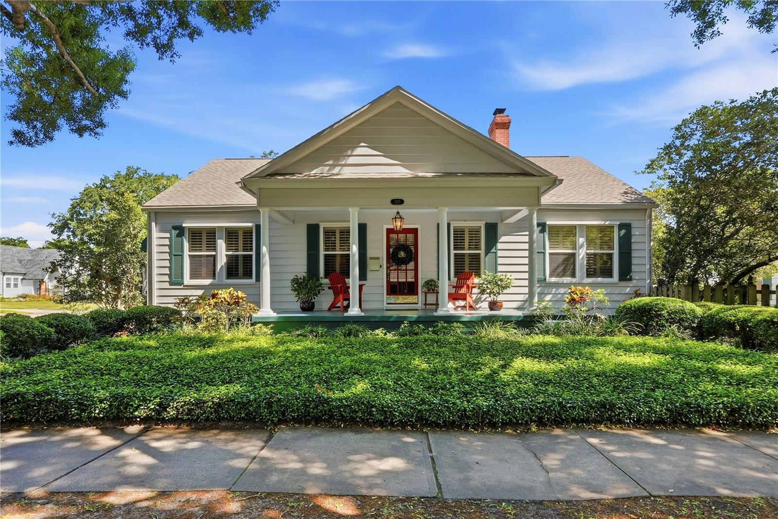 Welcome home to this beautiful 2 bedroom/2 bathroom home located in the center of Woodlawn Circle!  Sit on your covered front porch and socialize with your neighbors as they stroll the tree lined streets of the neighborhood.  The charm and character shine throughout this 1937 home.  Built in nooks, original hard wood floors, and a beautiful wood burning fireplace will make you want to call this place home.  The updated kitchen leads outside to a beautifully landscaped patio, perfect for entertaining or relaxing. Located in Flood Zone X, no flood insurance is required, and the home comes with storm shutters for additional piece of mind. Woodlawn Circle is perfectly located in the city, offering easy access to 275, the city, as well as the beaches.  This is your opportunity to live in one of the hottest neighborhoods in St Pete!