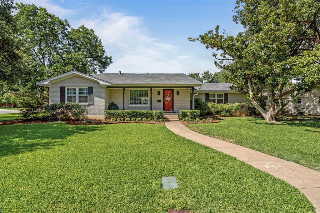 Beautifully updated home on an oversized corner lot, just blocks from Overton Park Elementary. This charming 3-bedroom, 3-bath features natural hardwood floors, an inviting living room with a large picture window, and a spacious eat-in kitchen with butcher block island, farm sink, upgraded lighting, and ample storage. The kitchen opens to a cozy den—ideal for everyday living or entertaining. Step outside to a large, private backyard, a remote-controlled privacy gate, and an expansive covered deck perfect for enjoying warm Texas evenings. Additional features include a 2-car carport and thoughtful updates throughout. Truly a must-see!