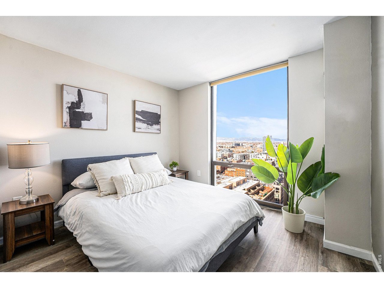 Experience the best of downtown living in this beautiful 25th-floor condo at Barclay's! Sweeping city views and modern updates throughout, this two bedroom, two bath unit features updated flooring, bathrooms, and a newly opened floor plan that enhances the home's light, flow, and functionality. You will love living in arguably the best location in Downtown Denver - 16th and Larimer! With dedicated deeded parking! Enjoy popular nearby neighborhood bars and restaurants along Larimer Street, including Tamayo, Osteria Marco, Rioja, and more. You're also just blocks from iconic Denver destinations such as Union Station, the Milk Market, Comedy Works, Coors Field, and beyond. Barclay's offers exceptional, hotel-inspired amenities, including an outdoor swimming pool overlooking the city, fitness facilities, a high-rise patio, onsite security, and lobby. If you're searching for a stylish downtown retreat with unmatched convenience, comfort, and incredible views, this property is a must-see.
