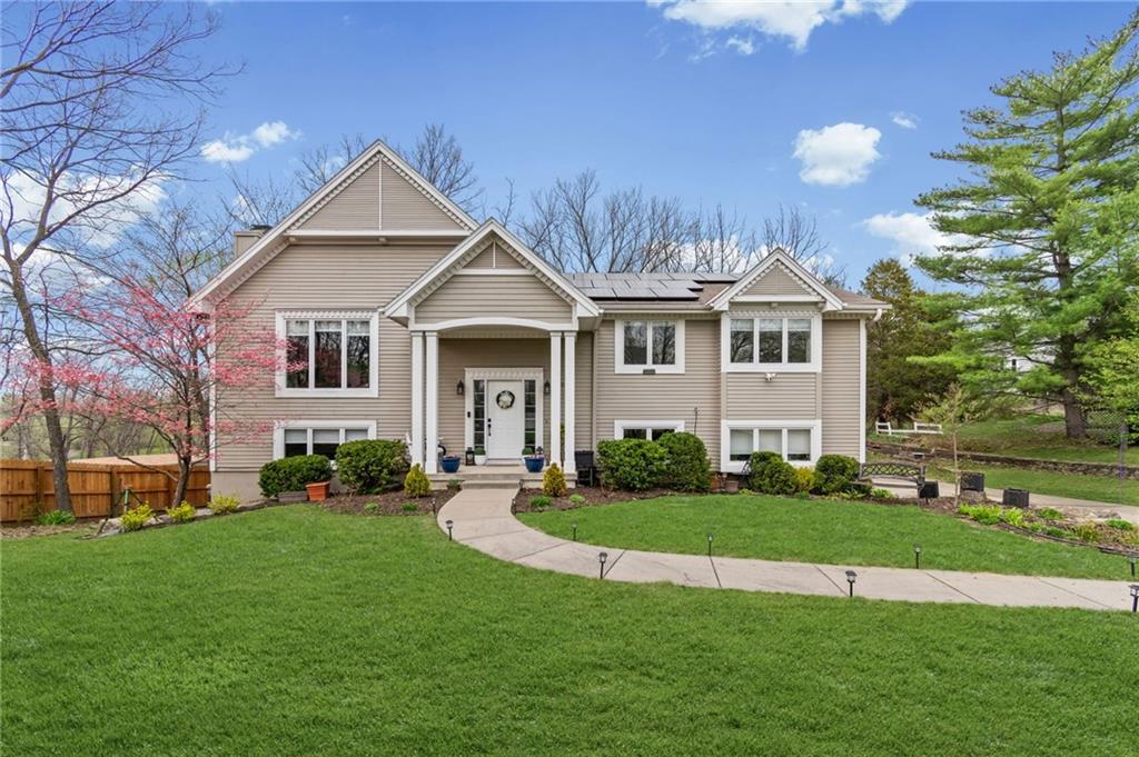 Welcome to this beautifully maintained traditional home, offering 4 bedrooms and 3 full bathrooms. Nestled on a private, quiet street, this home provides the perfect blend of comfort and tranquility. Step inside to find a meticulously cared-for interior with a functional layout ideal for both everyday living and entertaining. The home features generous living spaces, abundant natural light, and thoughtful updates throughout. Enjoy the serene, wooded backyard—perfect for relaxing, hosting gatherings, or simply taking in the natural surroundings. Located within Weatherby Lake, the best lake community in the northland! Here, you'll have access to scenic views and a peaceful neighborhood atmosphere as well as steps away from lake access. This move-in ready home is a rare find, combining privacy, charm, and pride of ownership in an exceptional setting.