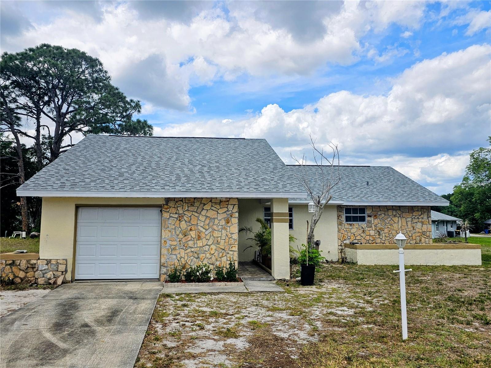 Welcome to comfortable Florida living in the highly sought-after Sun ‘N Lake community in Sebring—where convenience, recreation, and a strong sense of community come together. This beautifully refreshed 2-bedroom, 2-bath home offers an ideal layout, featuring sliding glass doors that open to a spacious screened porch—perfect for enjoying peaceful mornings or relaxed evenings year-round. Have peace of mind with a brand new 2026 shingles roof as well. Inside, you’ll find a brand-new kitchen with updated appliances, along with a fully remodeled master bathroom showcasing a stylish step-down shower. The home has been freshly painted in a clean, modern white, creating a bright canvas ready for your personal touch. Situated on an oversized corner lot with no HOA fees, this property offers both space and freedom. You’ll appreciate being just minutes from the AdventHealth Sebring, medical offices, restaurants, gas stations, and the renowned Sun 'N Lake Golf Club, along with access to community amenities including a pool and recreational facilities. Come experience the charm, value, and lifestyle that living in Highlands County has to offer—this is a place you’ll be proud to call home.