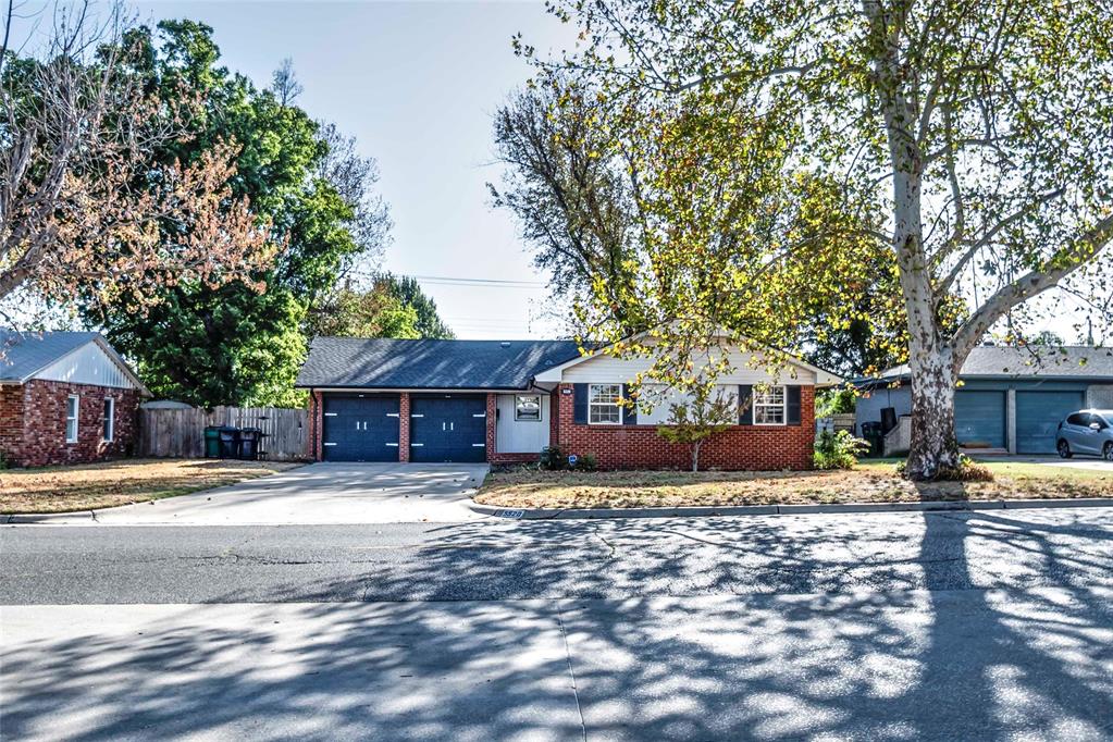 Welcome to this well-kept 3-bedroom, 2-bath home offering a comfortable layout, thoughtful updates, and plenty of space inside and out. Recent improvements include a new roof, new water heater, fresh interior paint, updated windows, and flooring throughout much of the home.  The classic floor plan features two spacious living areas, giving you plenty of flexibility for everyday living, entertaining, or creating a separate game room or family room. Both living spaces offer convenient access to the private backyard, creating an easy flow between indoor and outdoor living.  Step outside and enjoy the open patio and pergola overlooking the backyard, along with a nice outbuilding providing additional storage for lawn equipment, tools, and more. The attached two-car garage features a freshly painted floor, storm room, and ample room for vehicles plus additional storage.  Conveniently located within walking distance of Rotary Park, walking trails, and just a short drive from Lake Hefner, this home puts recreation, shopping, dining, and everyday conveniences within easy reach. With its updates, flexible living space, and great location, this home is ready for its next owner. Come take a look!
