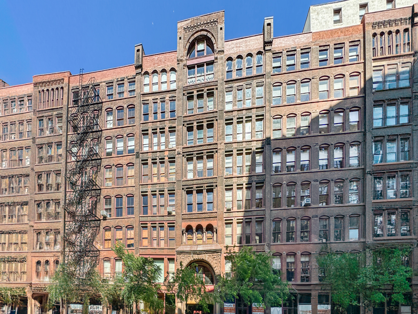 One of the finest lofts in Chicago, this perfectly renovated 4,200 sqft two-story condo offers massive, sun-filled living space in an ideal location! Key features of the 2021-22 renovation include new wide-board white oak hardwood floors, freshly painted walls, window frames, and columns, newly insulated ceilings, magnetic storm windows, quartz countertops, porcelain and clay tile floors, updated lighting, motorized shades, closet organizer systems, and so much more. This condo lives like a home! The front entry foyer has a wall of new closets and a guest bath. There are two fabulous living areas: a living/dining room with a gas fireplace and a family room/library with wall-mounted bookshelves. At the center of the home, the large white kitchen has been significantly upgraded and includes a massive island with breakfast bar seating, top-quality Thermador appliances, a new SubZero refrigerator (2021), and pantry storage. The built-in buffet/bar with storage, a second sink, and a beverage refrigerator are a plus. A floating staircase with treads fabricated from vintage oak planks leads up to the home's upper level. Here, the primary suite consists of a large, lofted bedroom, a beautiful new bath with dual vanities, a heated towel bar, a large walk-in shower, a private commode, and a huge walk-in closet that includes a small private office. The second and third bedrooms are each spacious and share an updated jack-and-jill bath. The fourth bedroom includes an en suite bath and a walk-in closet; however, the wall has been opened and it is now used as a craft room. A great amenity, the laundry room was enlarged, and storage cabinets, a utility sink, a clay tile floor, and a new front-loading GE washer and dryer were added. This home has zoned central heat and a/c  with new compressors. Central humidification is on one of the two systems. Garage parking is available directly behind the building at 711 S. Plymouth for $275-$325/month. ### Chicago's first residential loft conversion, the Donohue Building is in the heart of historic Printer's Row, steps from the Loop, Grant and Millennium Park, the lakefront, Soldier's Field, UIC, Rush Medical Center, world-class culture and dining, and award-winning schools, including the British International School's South Loop campus, St. Ignatius and Jones College Prep. For anyone looking for a thoughtfully upgraded one-of-a-kind loft condominium in the heart of the city, this is a perfect 10!