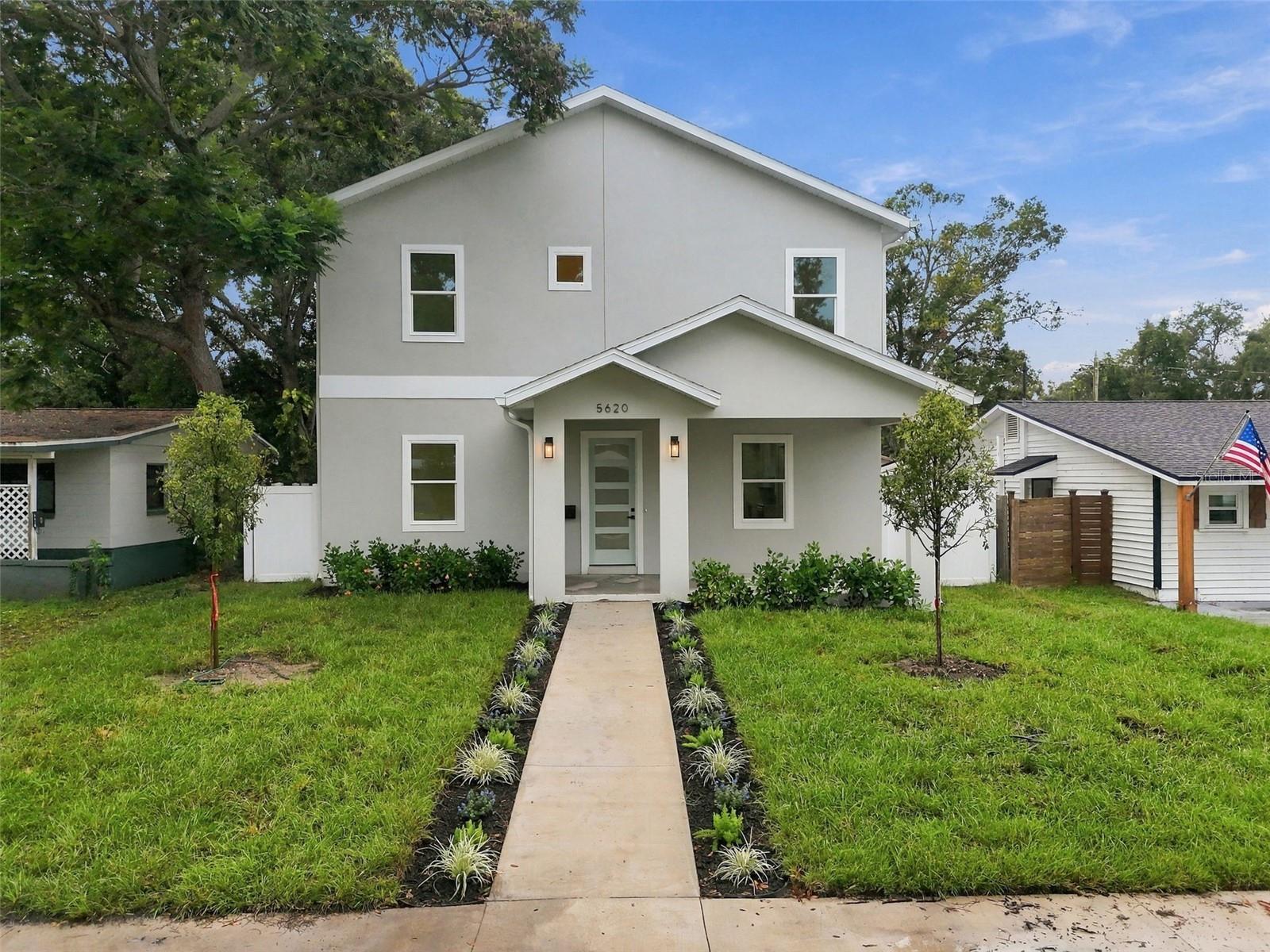 Two Homes, One Address: Space and Flexibility in St. PetersburgWelcome to 5620 3rd Ave N, a residence that offers both room to live and room to grow. The 2,345 square foot main home features 3 bedrooms, 2 1/2 bathrooms, and a dedicated bonus room that works as a home office, media room, or playroom. Ten foot ceilings throughout give every room an open, airy and bright feel from the moment you step inside.The kitchen is the heart of the home. Quartz countertops and stainless steel appliances surround an oversized island built for casual meals, entertaining, and everyday gathering. A builtin wine fridge and a dedicated coffee bar add convenience for morning routines and evening hosting alike.Every bedroom is generously sized. The primary suite is a true retreat, with dual walk-in closets that provide abundant storage. An oversized laundry room with ample cabinetry keeps the household organized and running smoothly.Set apart from the main residence, a detached 484 square foot accessory dwelling unit offers a full-sized bedroom, a complete kitchen, and its own living area. It’s an ideal setup for visiting family, long-term guests, multigenerational living, or a private studio or workspace.The seller is offering a $2,500 credit or allowance for closet and pantry shelving finish out.Thoughtfully designed and full of versatility, this St. Petersburg property is ready for its next chapter.