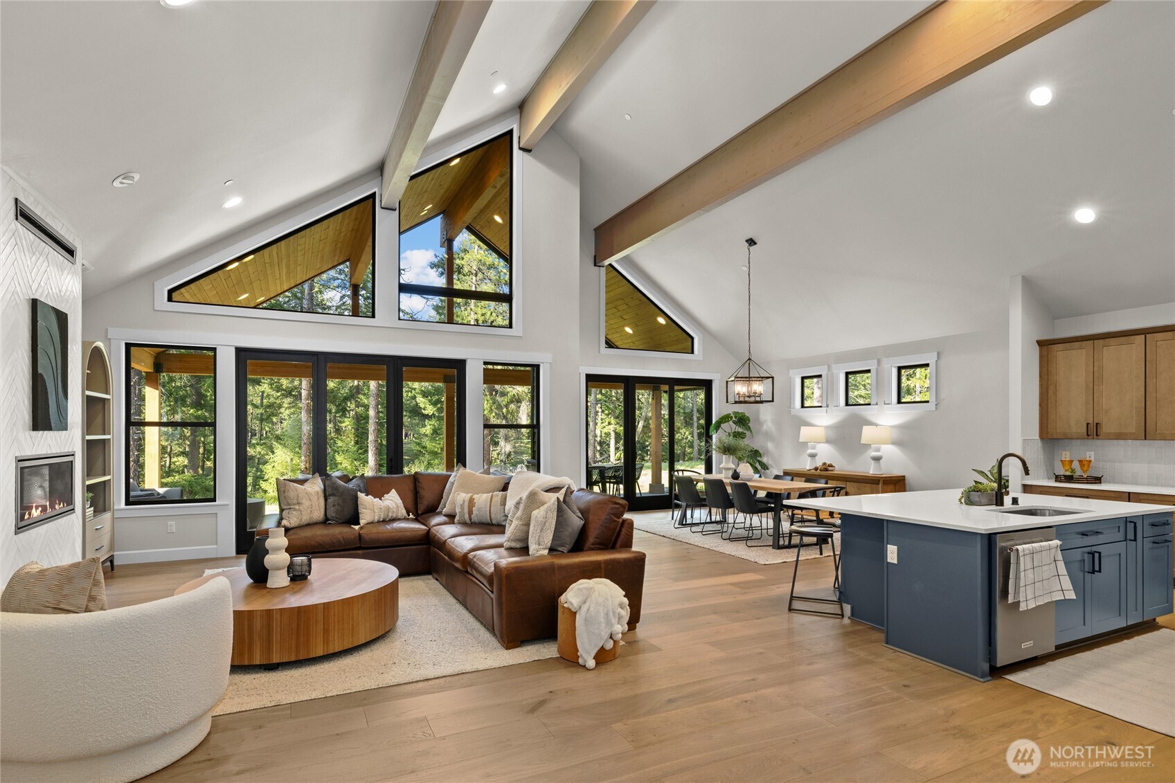 Open concept picturesque living room, dining and kitchen.