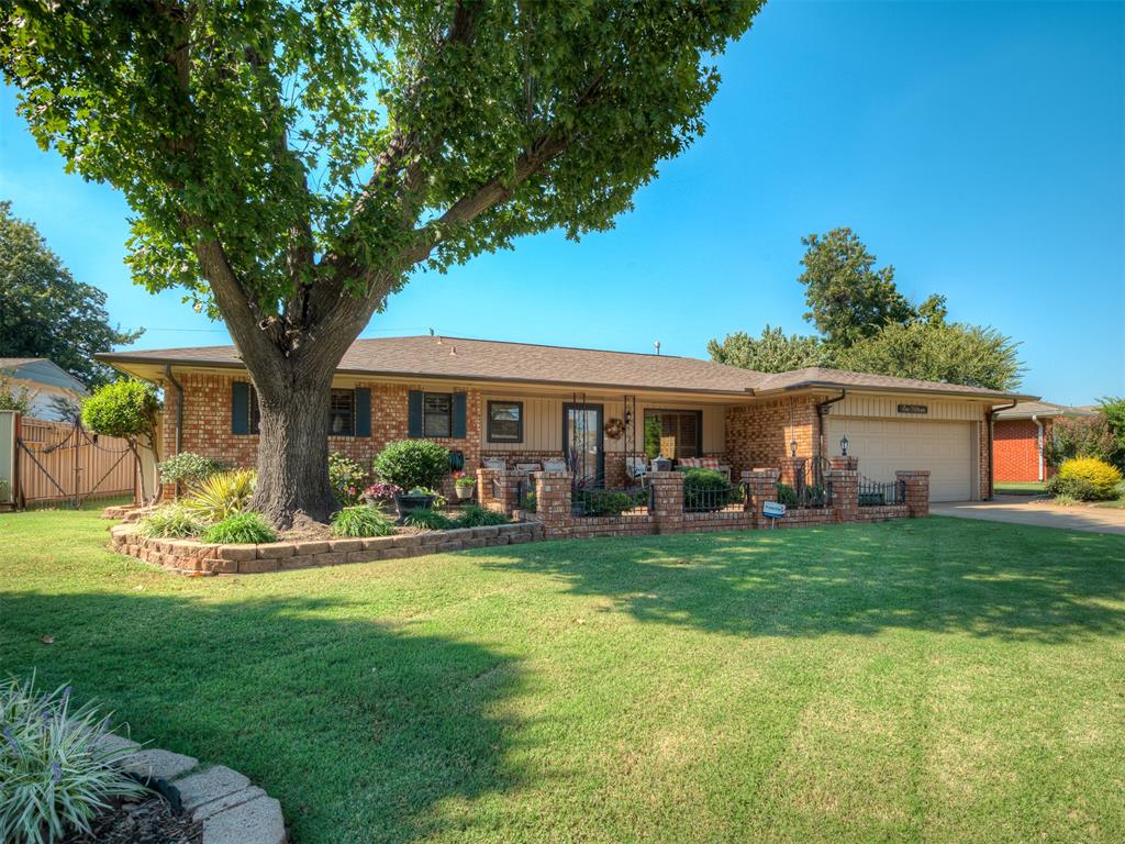 You will not find another property with so much care and attention to detail as this gorgeous home. Beautiful sprawling home with 3 living areas and a large open dining area.  When you open the door, you'll be greeted with beautiful hand scraped wood floors.  An amazing kitchen remodel in 2016 includes granite countertops, all new cabinets, and new lighting. The large open dining room includes it's own fireplace with hard carved mantel.  A beautiful compliment to the wood beams.  The main living area is the coziest and warmest space with warm wood ceiling and beams, a massive 6 foot wide fireplace and a comfortable sitting area in the window.  All of the beautiful wood and built-ins have been immaculately maintained.  The original 3 bedrooms was converted to 2 and could be turned back into a 3 bedroom.  Hot water heater-2016, New roof- 2021, Updates to one HVAC unit-2016, New second HVAC unit-2022, Sprinkler system, storm shelter below floor in living room, security system, and ceiling fans in every room.  Wow! But can we talk about the outdoor space?  The lush paradise includes a pergola sitting area, metal fencing all the way around for maximum privacy, and outdoor building with electricity. So much character and beauty that you'll want to see it for yourself in person!