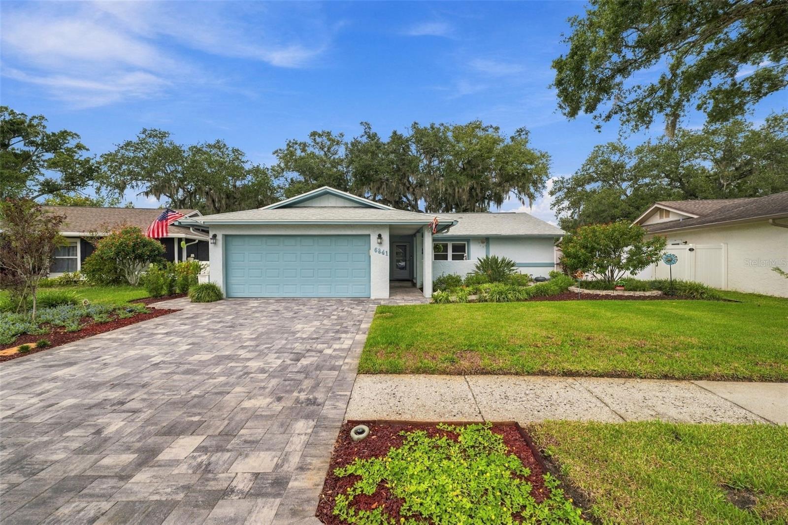 Welcome to your own private outdoor oasis! This beautifully updated 3-bedroom, 2-bathroom home with a 2-car garage offers the perfect blend of comfort, style, and peace of mind. Overlooking a tranquil canal, the dreamy outdoor setting provides a wonderful backdrop for morning coffee, entertaining, or simply relaxing and enjoying the Florida lifestyle. Inside, you’ll find new flooring throughout, creating a fresh and cohesive feel from room to room. Major updates include a 2025 roof, 2026 HVAC system with a 10-year warranty, 2024 water heater, and 2022 water softener. The 2-car garage features a new epoxy floor, adding both function and a polished finish. Located in Pinellas Park with no CDD fees and an optional HOA, this home offers flexibility and value. With its extensive updates, waterfront-style canal view, and inviting outdoor space, this is a home you’ll want to see!