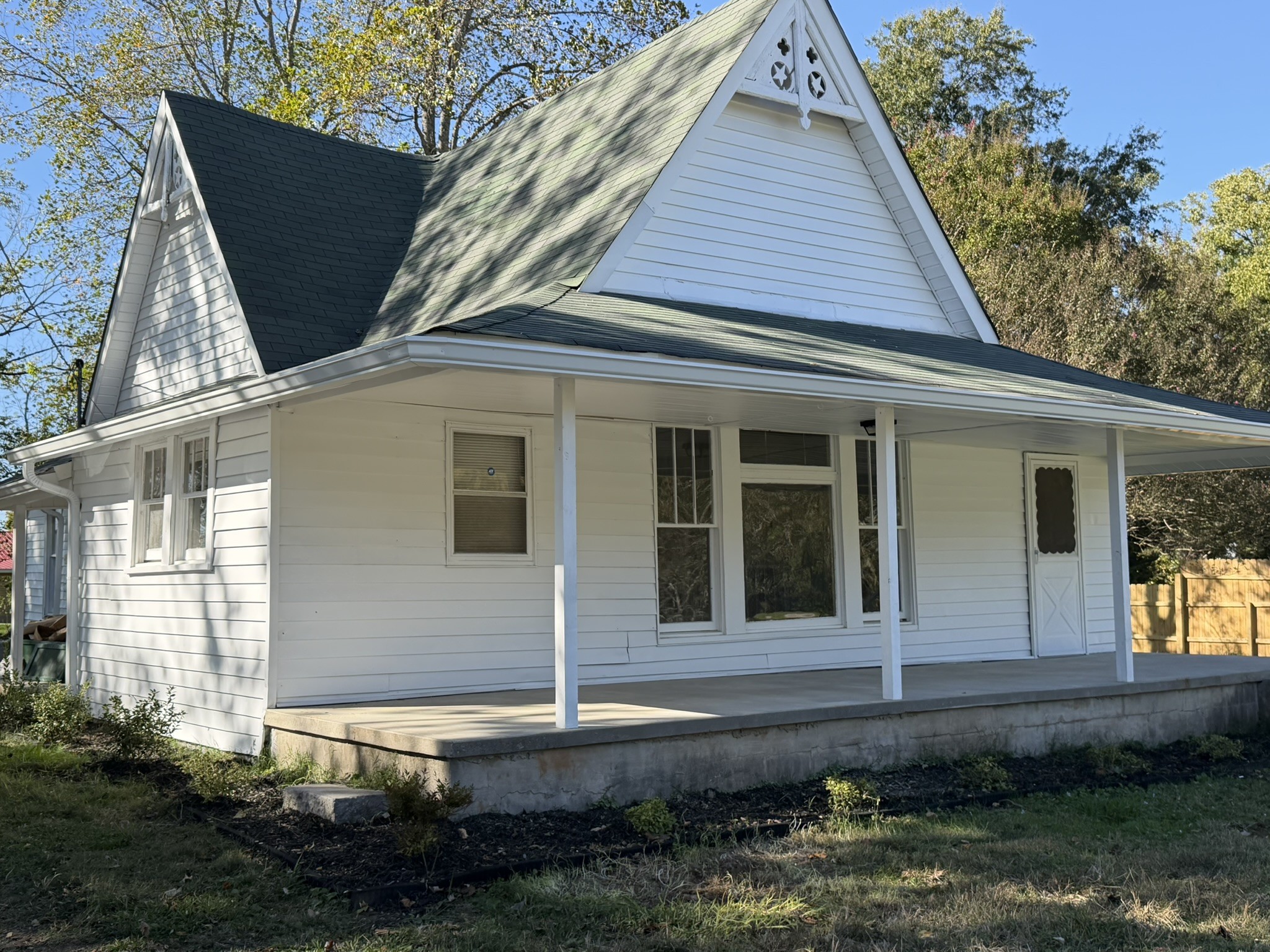 Step into this beautifully renovated 3-bedroom, 2-bath home where contemporary style meets peaceful country living. Nestled on over half an acre, this property offers space, comfort, and timeless charm. Enjoy morning coffee or evening sunsets from the expansive front porch—perfect for relaxing or entertaining. Inside, you'll find sleek modern finishes, a classic layout, and thoughtful updates throughout. Whether you're looking for a quiet retreat or a stylish country escape, this home delivers it all.