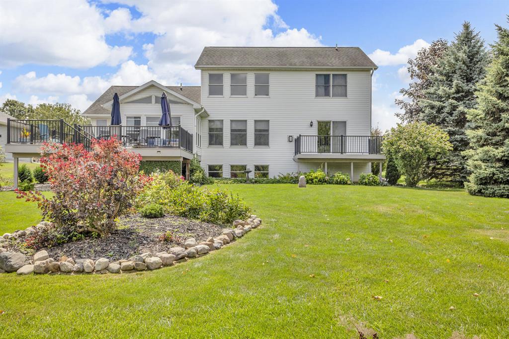 Loch Erin Lakefront Colonial with 84 ft. frontage! Immaculate 3,400 fin. sq. ft., 4-bedroom, 2.5 bath home features an open floor plan, great room with cathedral ceilings, gas fireplace and a wonderful wall of windows for beautiful views of the lake. Dining room, spacious kitchen, breakfast bar & terrific pantry, main floor laundry, two half baths, Main floor primary bedroom suite, with sliders to the deck. Spectacular Sunroom leads to 2nd deck for all your lake entertainment. 3 bedrooms on the upper level & one full bath.  Finished Lower level, family room, utility room with large storage room. 2 car garage. Wonderful lakeside yard with beautiful flower gardens. Lake living at its best on private 600-acre all-sports Loch Erin. Swimming, boating and relaxing. Come and enjoy the lake.