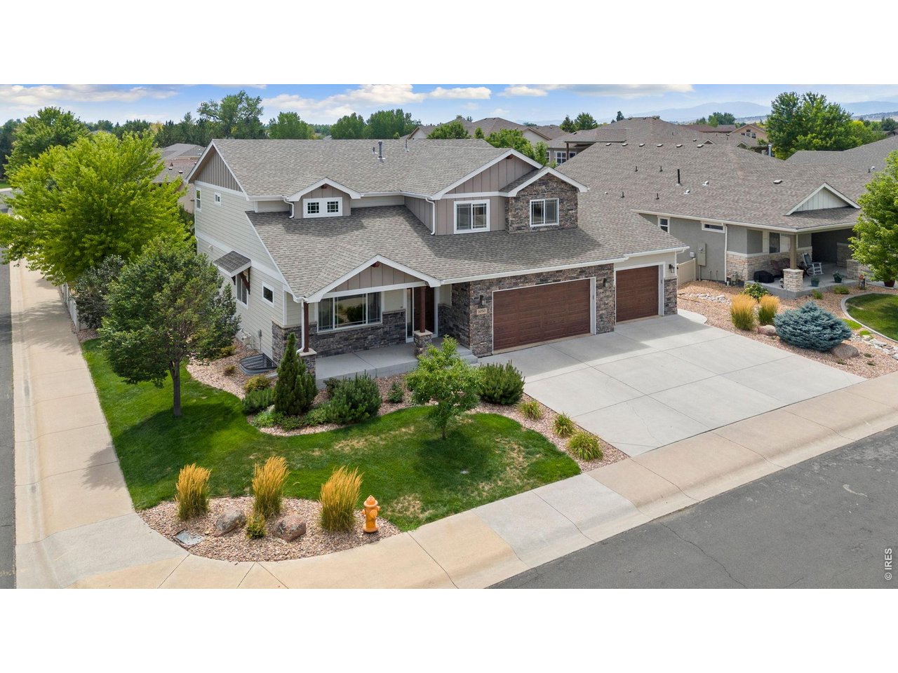 Welcome to 1050 Coral Burst Drive in Crescendo Village at Alford Meadows. Built in 2017, this spacious home offers more than 4,100 finished square feet, 6 bedrooms, 5 baths, and a standout 1,044 sq. ft. attached garage with 4-car capacity, polyaspartic floors, and exceptional room for vehicles, toys, storage, and hobbies. Inside, the main level features hardwood floors, rich alder doors and trim, a dedicated office, generous kitchen and dining spaces, and an inviting living room that opens to the covered back patio. Upstairs, you'll find the primary suite along with three additional bedrooms and two full baths. The finished basement adds two more bedrooms, a 3/4 bath, family room, flex space, and a dedicated home theater. Outside, enjoy a nearly quarter-acre lot in the desirable Crescendo Village section of Alford Meadows, with access to a community pool, park, trails, and open space, all with no metro district. If you've been looking for generous living space, quality finishes, a finished basement, and serious garage capacity without giving up neighborhood amenities, this one deserves a look. Seller is a licensed Colorado real estate broker and is acting as the listing broker in this transaction.