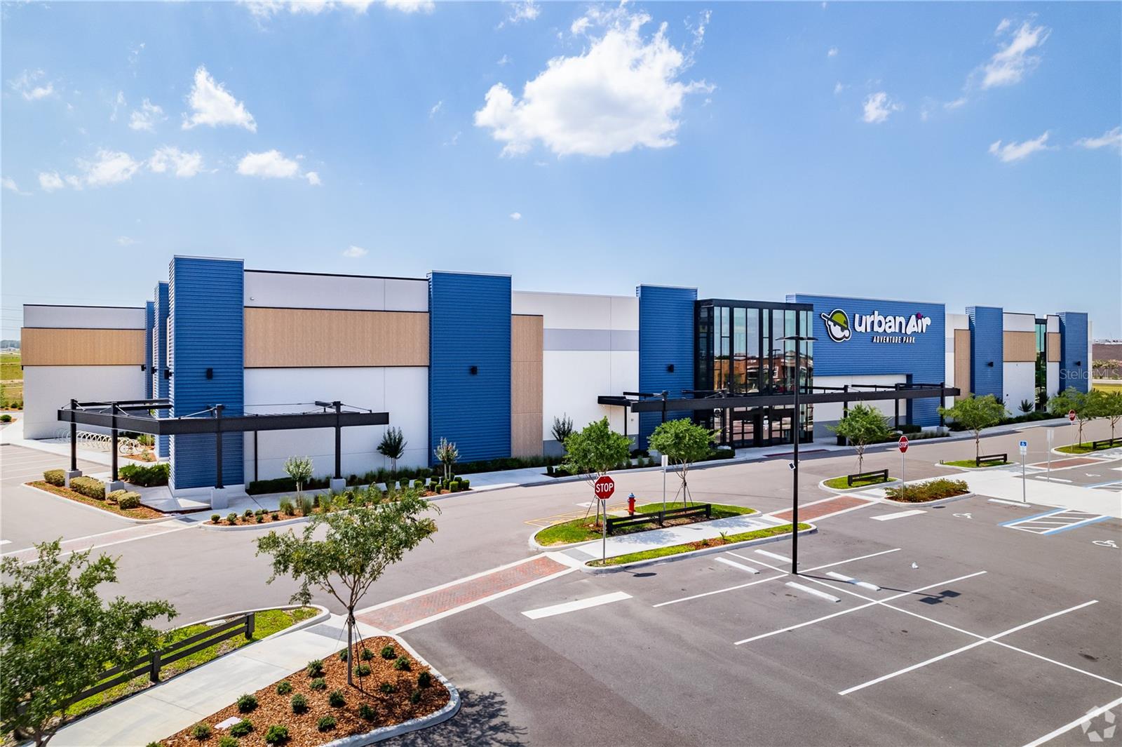 Rare Triple-Net Investment Opportunity: Flagship Leisure Anchor in America’s 2nd Best-Selling Community – Hamlin/Horizon West. Own a premier 61,844-square-foot Class A commercial asset situated in the heart of the 1,200-acre Hamlin master-planned development. This investment offers an exceptional arbitrage opportunity for a savvy buyer, pairing a high-performance corporate tenant with a long-term, secure ground lease in one of the nation's fastest-growing corridors.The purchase of the 5758 Hamlin Groves Trail building is a bet on a "flourishing" community that has transformed from raw land in 2011 to a 1,200-acre connected powerhouse in 2022. With thousands of homes still planned for the five villages of Horizon West and significant infrastructure projects underway, the area's commercial vacancy remains low while provider demand continues to escalate. This asset is perfectly positioned to capture the long-term value of Central Florida’s most successful "Live, Work, Play" destination. Offering Memorandum and NDA available for interested investors.