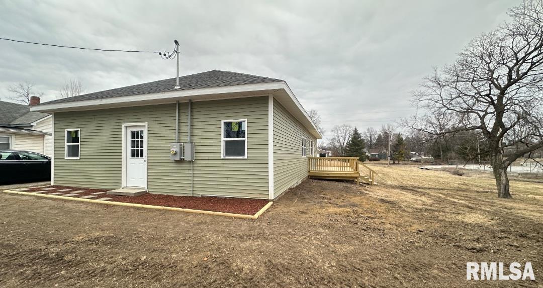 Fully renovated 4 bedroom, 2 full bath home located at 143 E Clinton Street in Rushville, Illinois. Offering 1,457 square feet of living space and situated on three separate city lots totaling approximately 0.6 acres, this property provides rare space both inside and out within city limits. Recent improvements completed within the last year include updated siding with added insulation, updated HVAC system, updated water heater, updated windows, updated drywall, updated plumbing, and updated electrical systems. The interior layout offers functional living space with main floor laundry and generous room sizes throughout. The large rear deck creates additional outdoor living space, and the expansive yard across three parcels provides flexibility for recreation, gardening, storage, or future use. Move-in ready 4 bedroom home in Rushville IL with major system updates already completed.