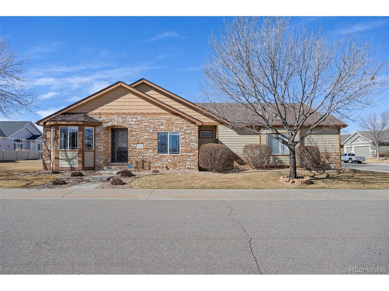 Welcome to 4735 Mimosa Street in northwest Loveland - a beautifully maintained ranch-style home with a professionally finished basement offering 3,208 total square feet of comfortable living space. The thoughtfully designed floorplan features true main-level living with the primary suite, guest bedroom, and dedicated home office all on the main floor. The gourmet kitchen showcases slab granite countertops, gas cooktop, double ovens, stainless steel appliances, walk-in pantry, and rich 42-inch alder cabinetry. Hardwood flooring flows through the main living areas, and the vaulted great room is highlighted by a gas fireplace with travertine and slate accents. The spacious primary suite offers vaulted ceilings, bay window, and a five-piece bath with travertine finishes, jetted tub, rain shower, and large walk-in closet. The finished basement provides a generous recreation room, two additional bedrooms, and a full bathroom. Nine-foot basement walls create an open feel and flexible living options. Major updates include a new roof and gutters in September 2024, exterior paint in 2024, and a tankless on-demand water heater replaced in July 2023. Additional features include a whole-home humidifier with UV lamp, central vacuum, covered patio, and a super clean oversized insulated three-car garage with 220V service, two 8-foot doors, openers, and service door. Located near parks, walking trails, shopping, and dining, with easy access to Boyd Lake, Carter Lake, the foothills, and I-25. Move-in ready, low maintenance, and exceptionally cared for.