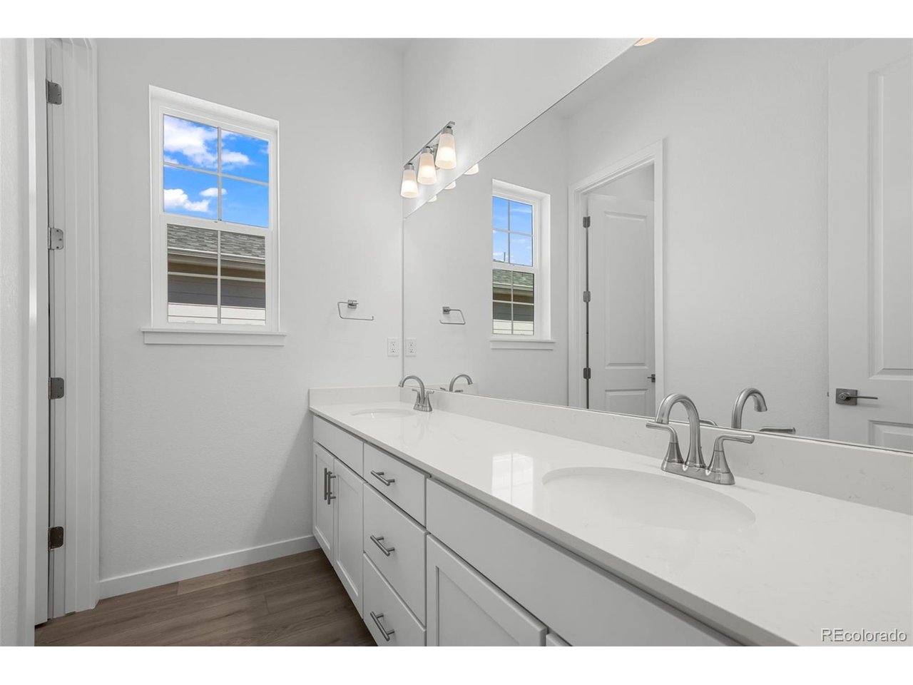 ** Lending Incentives may apply** Stunning ranch home with a 3-car garage, designer finishes throughout, with an ideal main-floor living setup. This property fronts to a community open area. This home features a bright office with French doors and durable LVP flooring. The gourmet eat-in kitchen boasts a large center island, quartz countertops, gas cooktop, double convection ovens, and a spacious pantry. The great room offers natural light and a fireplace, perfect for relaxing or entertaining.The main floor also includes a primary suite with dual vanities, LVP flooring, quartz counters, and dual walk-in closets, along with two additional bedrooms, a full bathroom. A convenient laundry room and powder room complete the main level. The finished basement is ideal for entertaining, featuring a spacious recreation room, a wet bar with quartz countertops, an additional bedrooms, a 3/4 bath, and a versatile flex space that can serve as a fifth bedroom, office, or gym.Enjoy a prime location near Boyd Lake and Centerra Shopping Center, with plenty of dining, shopping, parks, and trails nearby. With easy access to I-25, commuting to Boulder, Fort Collins, Denver, or Denver International Airport is easy. Don't miss this amazing opportunity to own a stunning home with a 3-car garage in the perfect location!