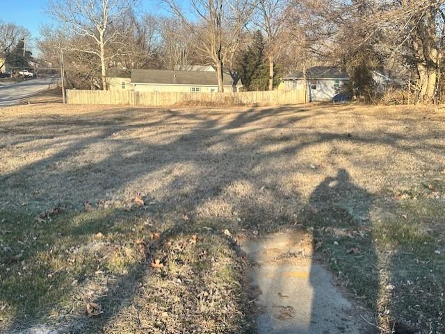 Located at 315 E Maple Street in Nevada, Missouri (also recognized as 424 S Lynn Street), this spacious 80x160 corner lot offers road frontage on two sides and excellent flexibility for future development. The property carries dual addresses, adding both convenience and visibility. Currently zoned R1 for single-family residential use, it presents an ideal building site for a new home. There is also the potential to apply for rezoning to R2 should a duplex configuration be desired, creating added investment opportunity. Water and electric are already on the property, and sewer access is nearby. This is a strong opportunity for anyone looking to build in a well-positioned Nevada location