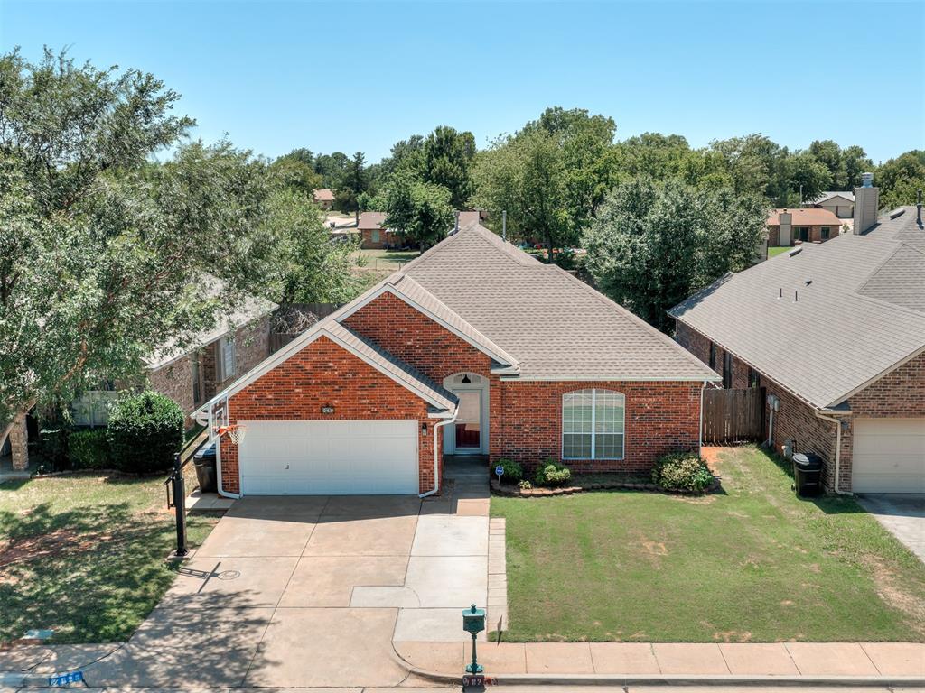 This beautifully updated 4-bedroom, 2-bath home offers approximately 2,500 square feet of thoughtfully designed living space on a spacious quarter-acre lot. From the moment you step inside, you'll notice the brand-new luxury vinyl plank flooring that flows throughout the entire home, creating a modern and cohesive feel.The heart of the home features an updated kitchen with abundant cabinetry, a walk-in pantry, new dishwasher, over-the-range microwave, and a brand-new oven with air fryer functionality. The spacious primary suite offers a beautifully remodeled bathroom complete with a luxurious Japanese soaking tub, creating the perfect private retreat.Outside is where this home truly shines. Spend your summers enjoying the pool featuring a new liner, pump, and filter, then relax under the pergola or gather around the extended patio's wood-burning fireplace for evenings with family and friends. The home also features an in-ground basketball goal, storage building, and storm cellar, offering both recreation and peace of mind.Additional updates include a new water heater (2025), updated soffits and guttering (2021), remodeled secondary bathroom (2017), and a 2013 roof. Inside, you'll also enjoy a cozy gas fireplace and generous storage throughout.With major system updates already completed and incredible indoor and outdoor living spaces, this home is truly ready for its next owners to move in and start making memories.
