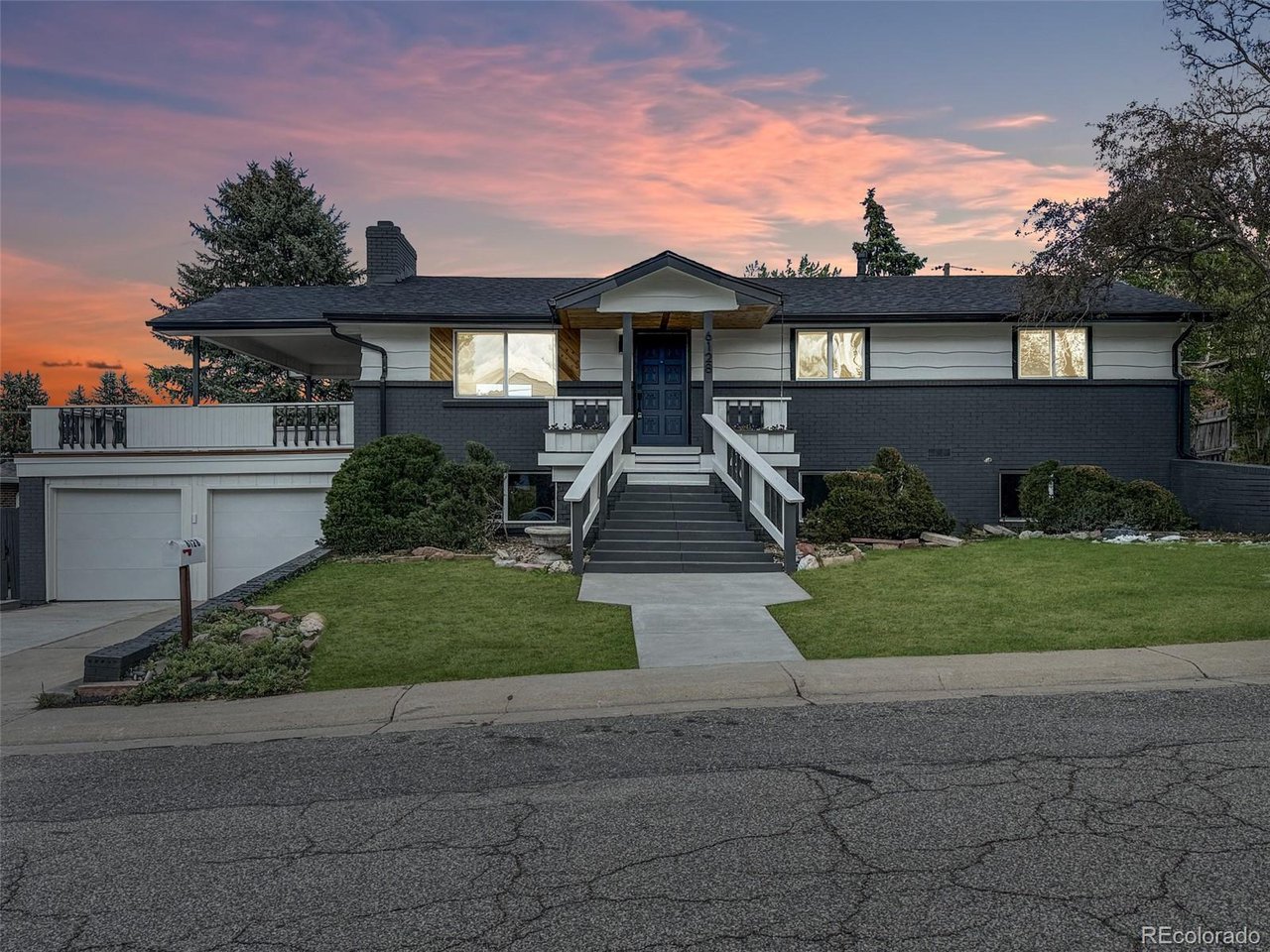 Welcome to 6128 Xenon St, a fully reimagined 5-bedroom, 3-bathroom home blending luxury finishes, open-concept living, and exceptional indoor-outdoor spaces in one of Arvada's most desirable locations. Designed to impress, the stunning primary suite is the home's centerpiece. It features a spacious walk-in closet and a spa-inspired en suite bathroom with a large walk-in shower, dual shower heads, and built-in bench seating - creating a true retreat feel rarely found in the area. The brand-new kitchen showcases quartz countertops, a large island, gas range, and a full suite of upgraded stainless steel appliances, all seamlessly connecting to the dining and living spaces beneath tall ceilings and abundant natural light. The open main-level layout flows effortlessly to the deck, half covered for year-round enjoyment, where mountain views create the perfect backdrop for relaxing summer evenings and entertaining guests. The walkout basement offers incredible additional living space with a large family room, three spacious bedrooms, and a beautifully updated bathroom featuring a double vanity. A brand-new stacked washer and dryer are included in the dedicated laundry room for added convenience. Step outside to the covered patio and enjoy the large fully fenced backyard, ideal for entertaining, pets, or play. Located just a short walk from Meadow Lake, this home offers the perfect balance of modern luxury, functionality, and outdoor lifestyle. Complete with a spacious 2-car garage and extensive updates throughout, 6128 Xenon St is a rare turnkey opportunity in Arvada.