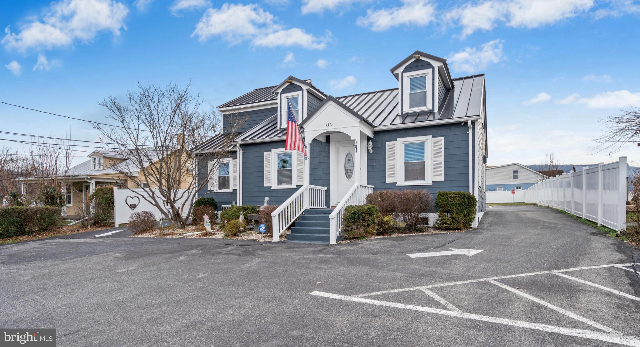 Rare opportunity!  Perfectly positioned in the heart of historic Harpers Ferry, this fully renovated Cape Cod offers exceptional flexibility with zoning that supports residential, commercial, or mixed-use living. Thoughtfully redesigned and updated in 2025, the property seamlessly blends character, modern function, and income potential — making it ideal for investors, owner-occupants, or entrepreneurs seeking a true live-work solution.Offering nearly 1,850 square feet of finished space, the home is intelligently configured to function much like a spacious duplex with two private entrances, allowing for complete separation and privacy.  Whether you envision a high-performing short-term rental, multigenerational living, or a home-based business, this layout adapts effortlessly to your goals.The main level features two fully updated kitchens, two laundry areas, three full baths, formal living and dining spaces, and a versatile flex room.   A highlight of the home is the turnkey Airbnb-style suite, complete with a Murphy bed, full kitchen, walk-in shower, dedicated laundry and dressing area — perfect for guests, extended family, or rental income.   An oversized primary bedroom with a beautifully updated ensuite bath further enhances the home’s residential appeal.Upstairs, you’ll find three additional rooms, a half bath, and a loft-style space ideal for a media room or game area.  Two of the rooms include their own shower stalls and sinks, offering added privacy and convenience for guests or multiple occupants.This property comfortably accommodates large groups (up to 10 guests) and is well-suited for:• Living in one side while generating rental income from the other• Multi-family or intergenerational living• Housing traveling professionals, contractors, or medical staff• Operating a business, salon, or studio on one side while residing in the other (previously a long-running, successful spa and salon)Property Highlights:• 1,848 sq ft of finished living space• Five bedrooms plus a private income-producing suite• Three and a half bathrooms• Two full kitchens & two laundry areas• Two living rooms & two dining rooms• Metal roof (2023) & new water heater (2025)• Nine off-street parking spaces plus street parking• Two-car garage & outdoor living area• Handicap-accessible ramp• All Airbnb furnishings and business contents convey• Walkable to downtown Harpers Ferry, shops, dining, and trailsThis is a truly versatile asset in one of West Virginia’s most sought-after historic destinations — offering lifestyle flexibility, strong cash flow potential, and unbeatable walkability.  A rare chance to own a property that works as hard as you do.